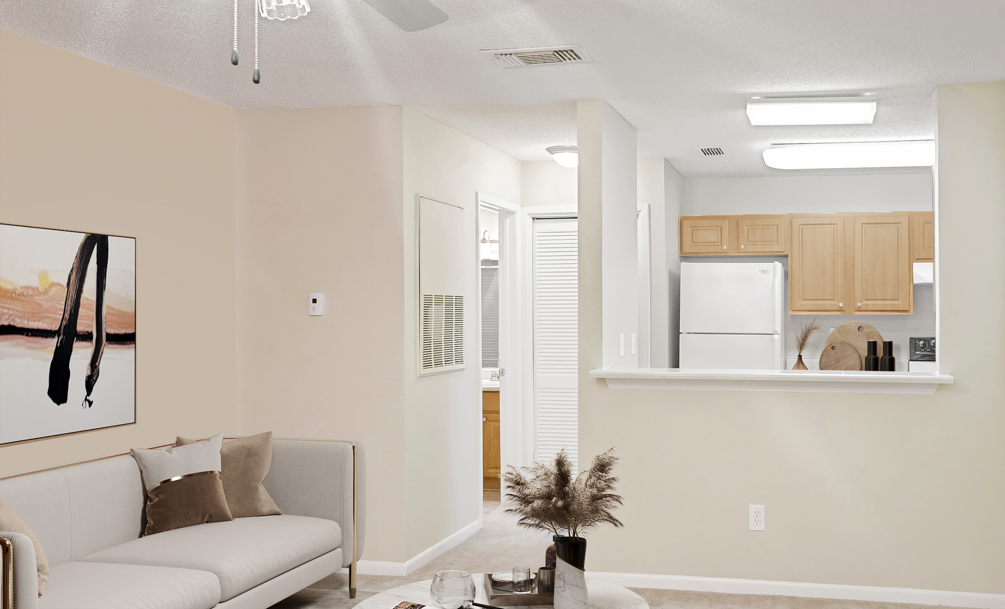 The living area of an apartment at The Arbors of Wells Branch in Austin, TX.