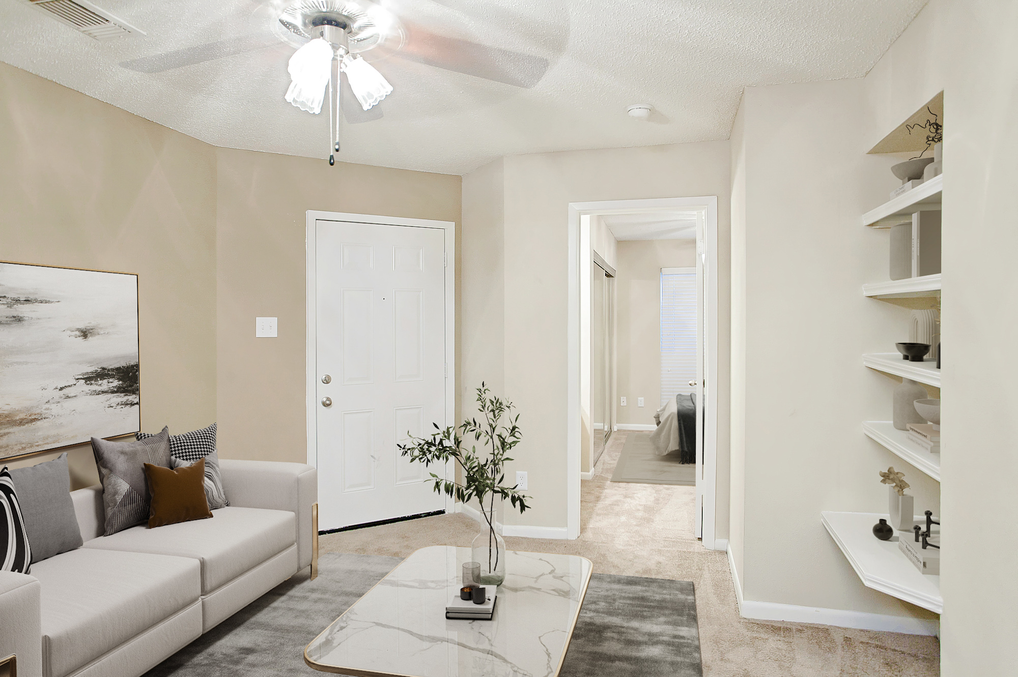 The living area of an apartment at The Arbors of Wells Branch in Austin, TX.