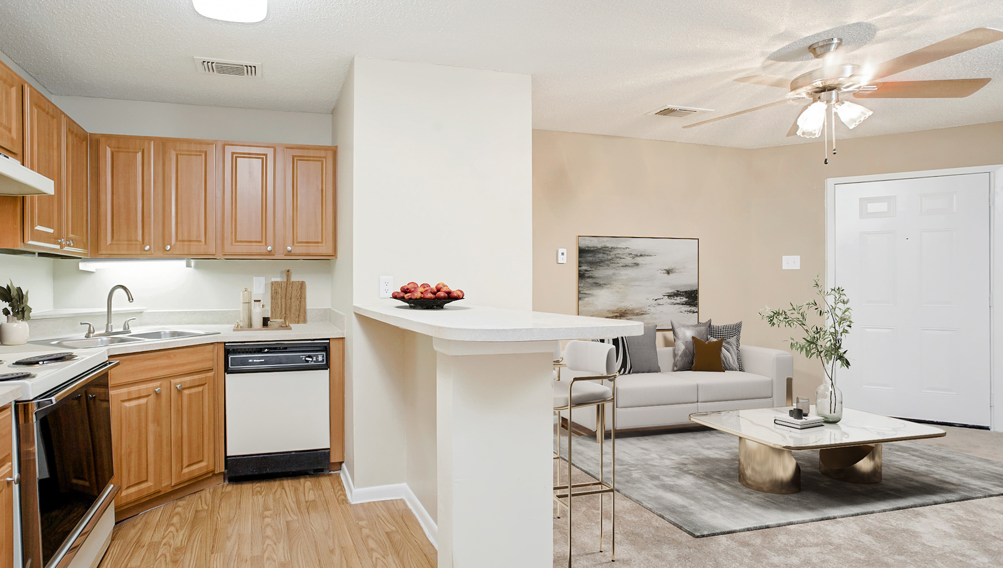 The living area of an apartment at The Arbors of Wells Branch in Austin, TX.