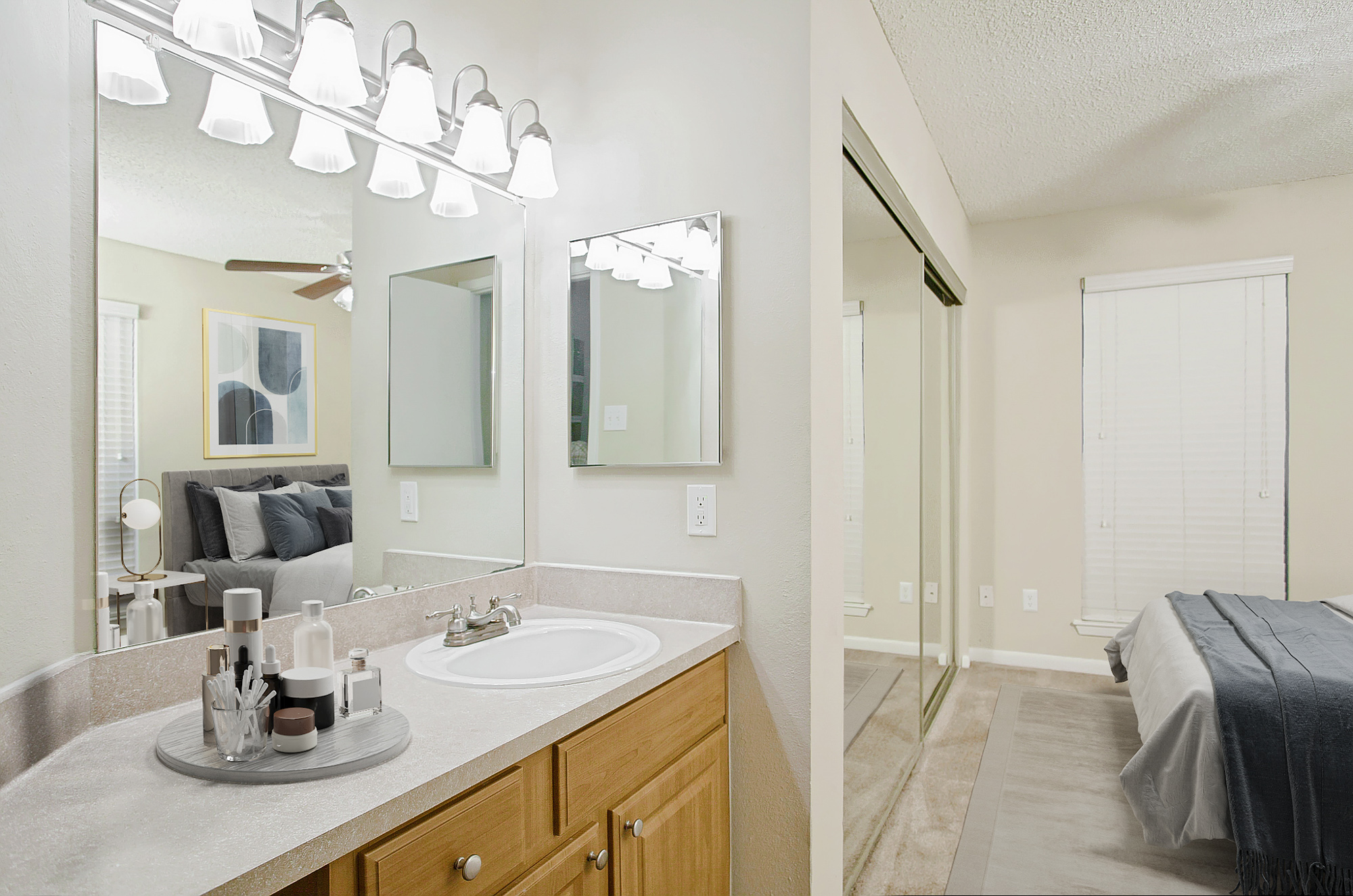 The bedroom of an apartment at The Arbors of Wells Branch in Austin, TX.