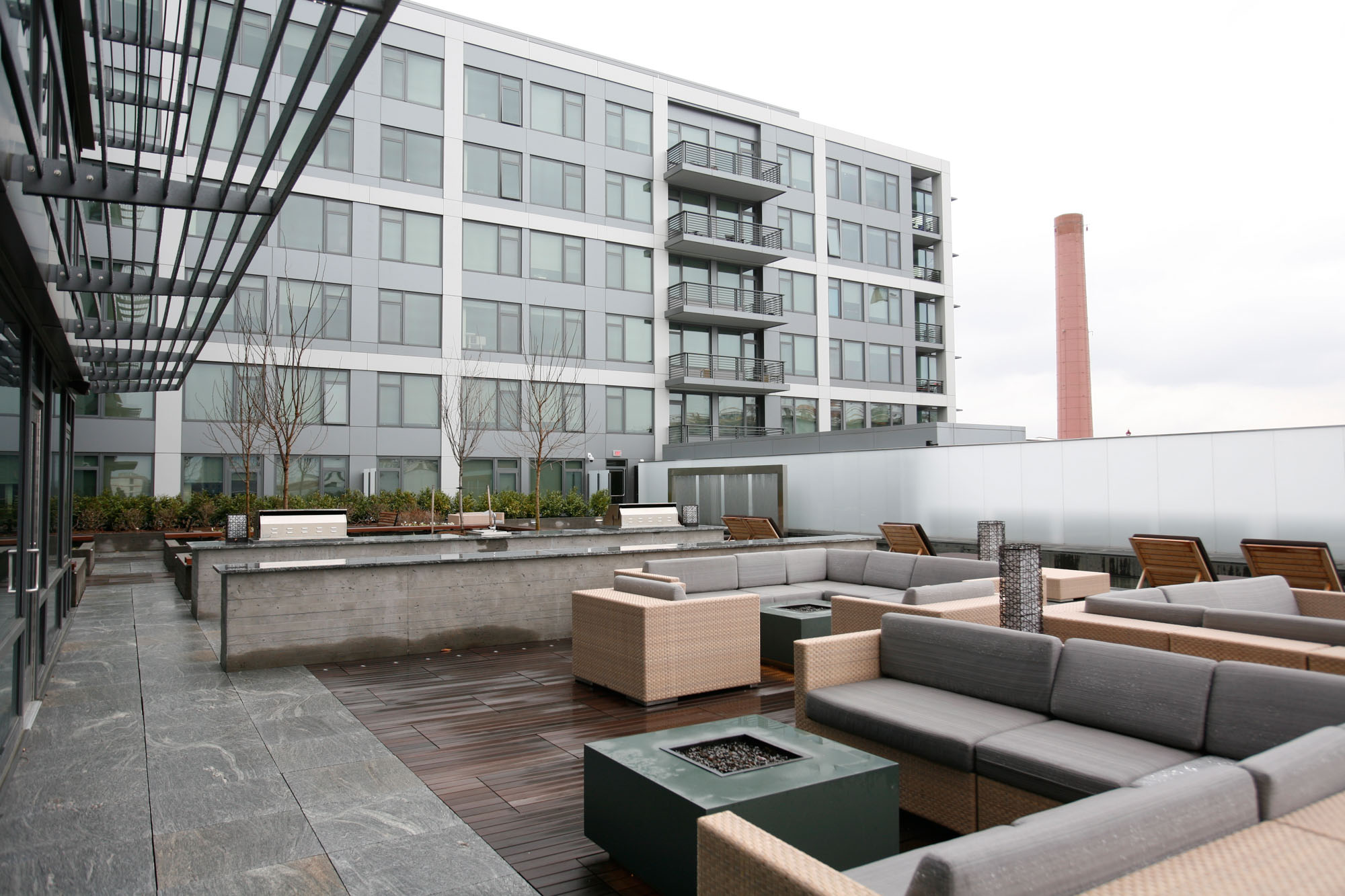 The outdoor terrace with lounges and fire pits at Twelve12 in Navy Yard, Washington DC.