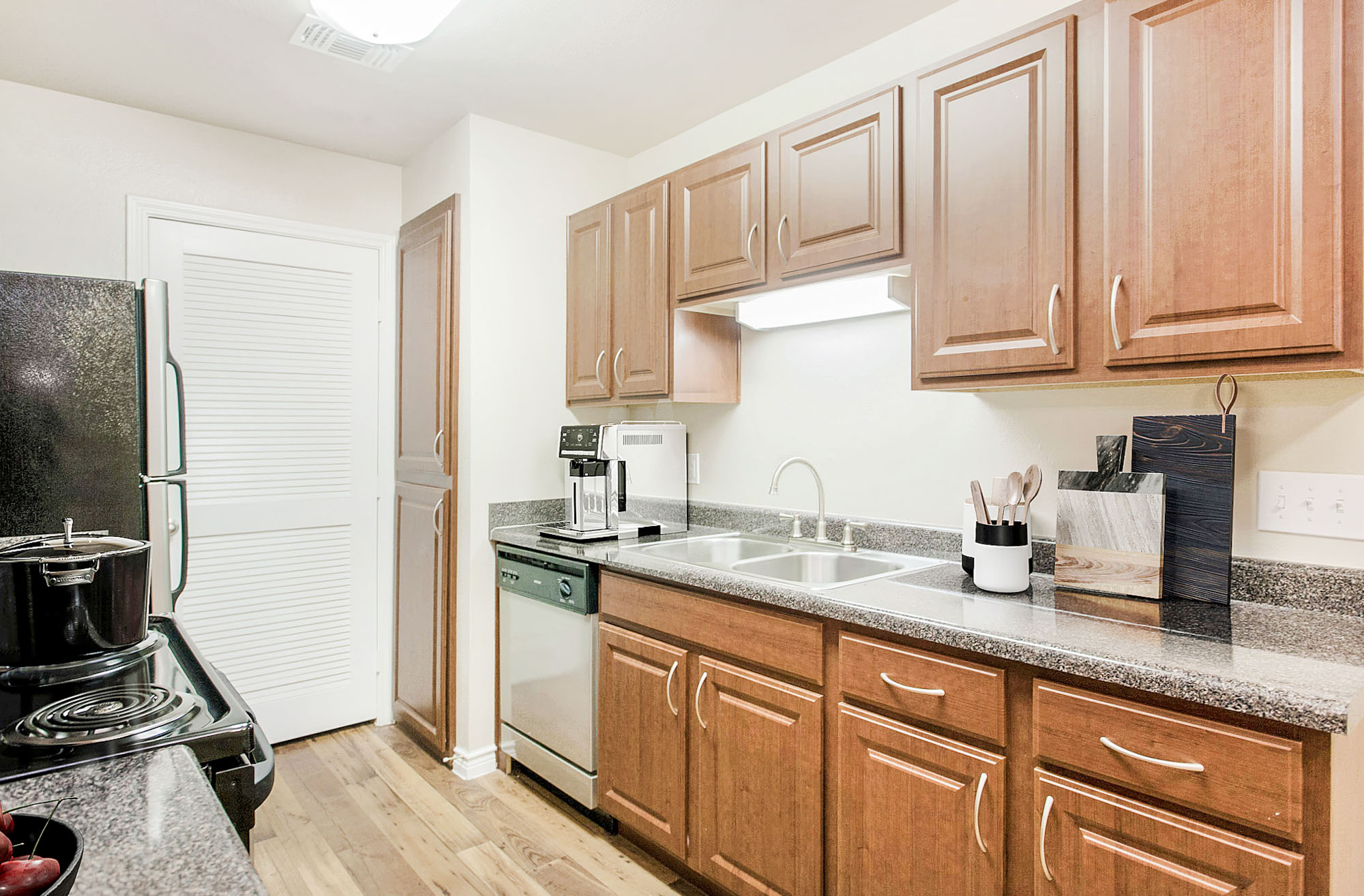 The kitchen in an apartment at The Gables of McKinney in McKinney, TX.