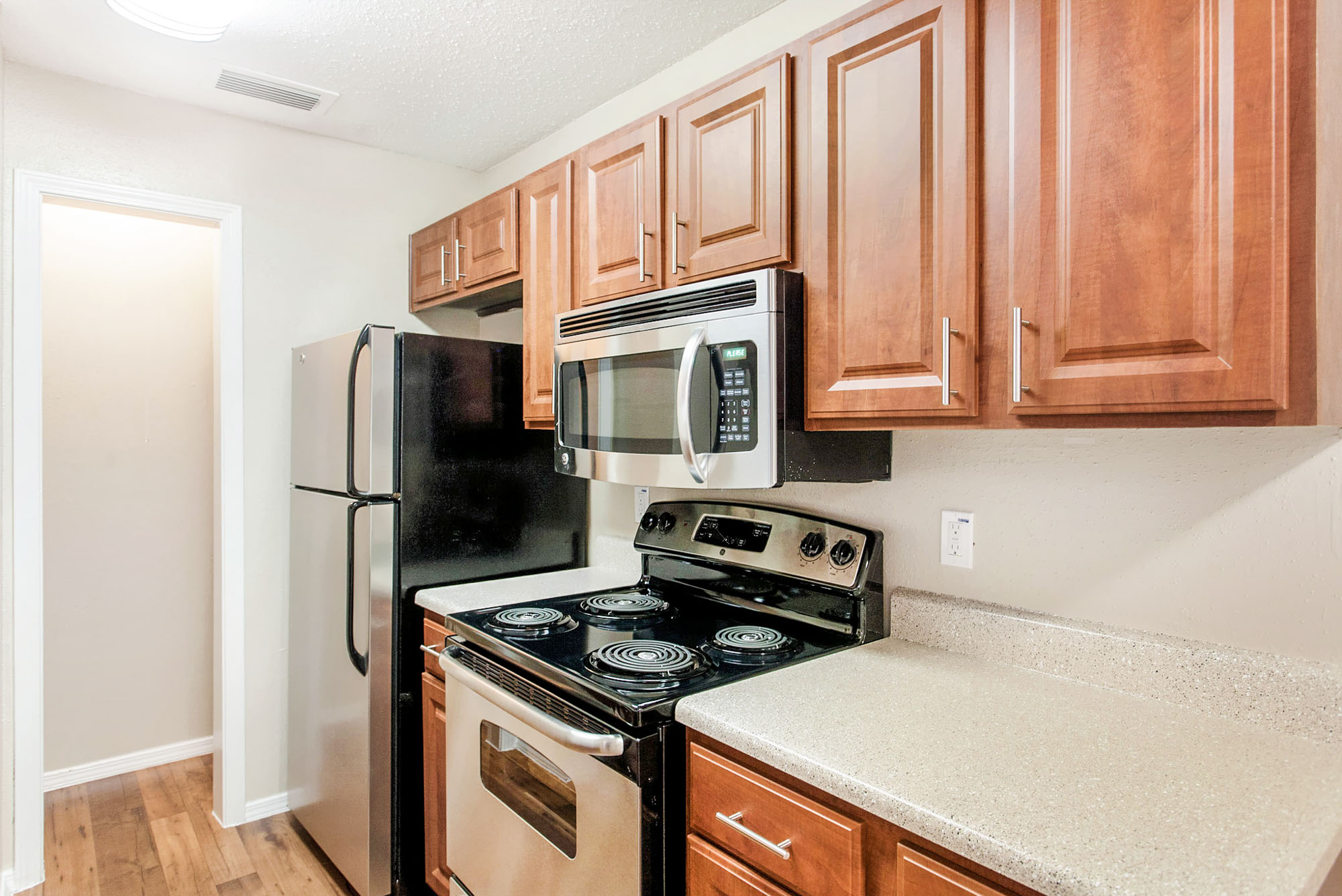 The kitchen in an apartment at The Gables of McKinney in McKinney, TX.