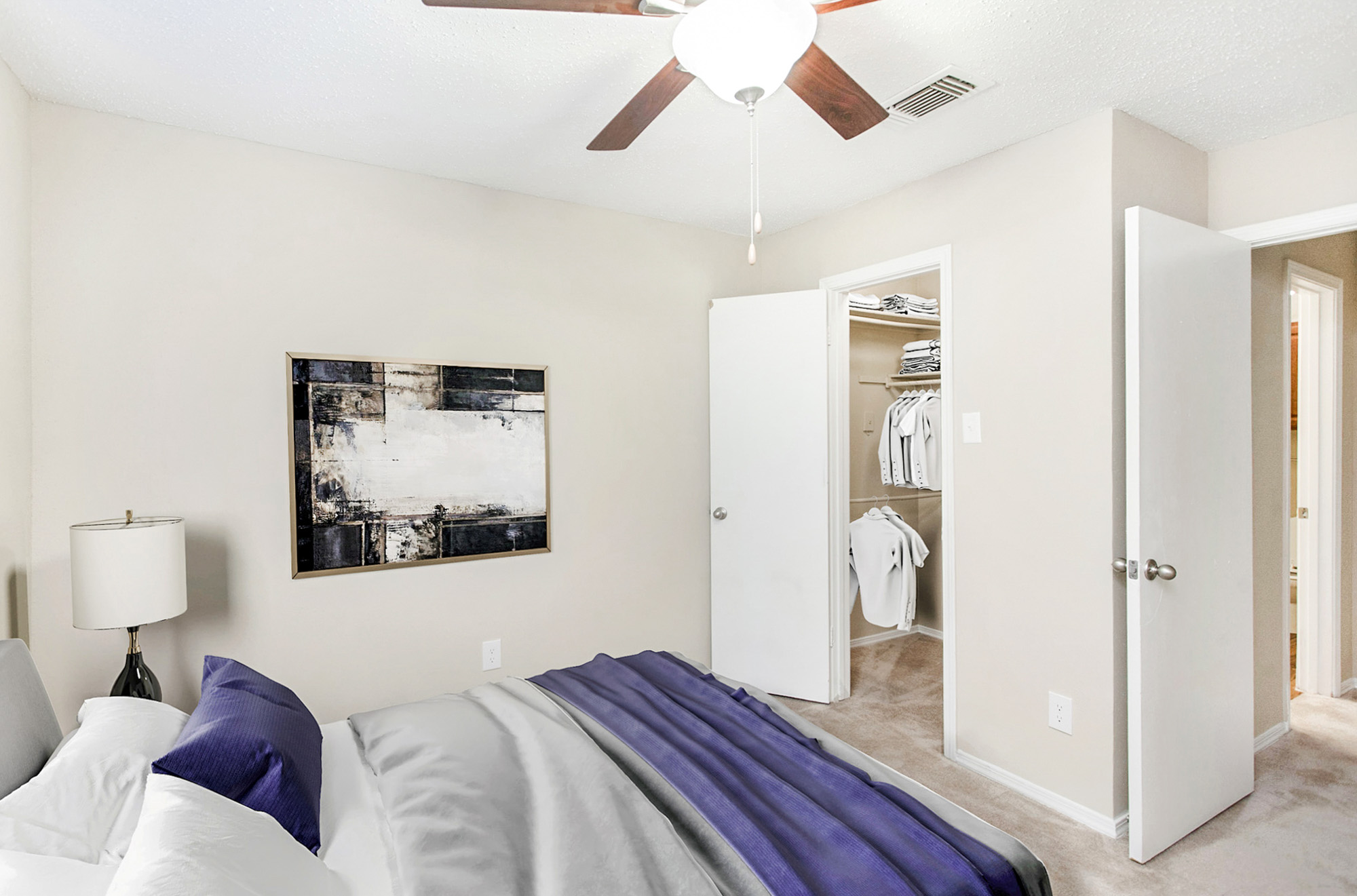 The bedroom in an apartment at The Gables of McKinney in McKinney, TX.