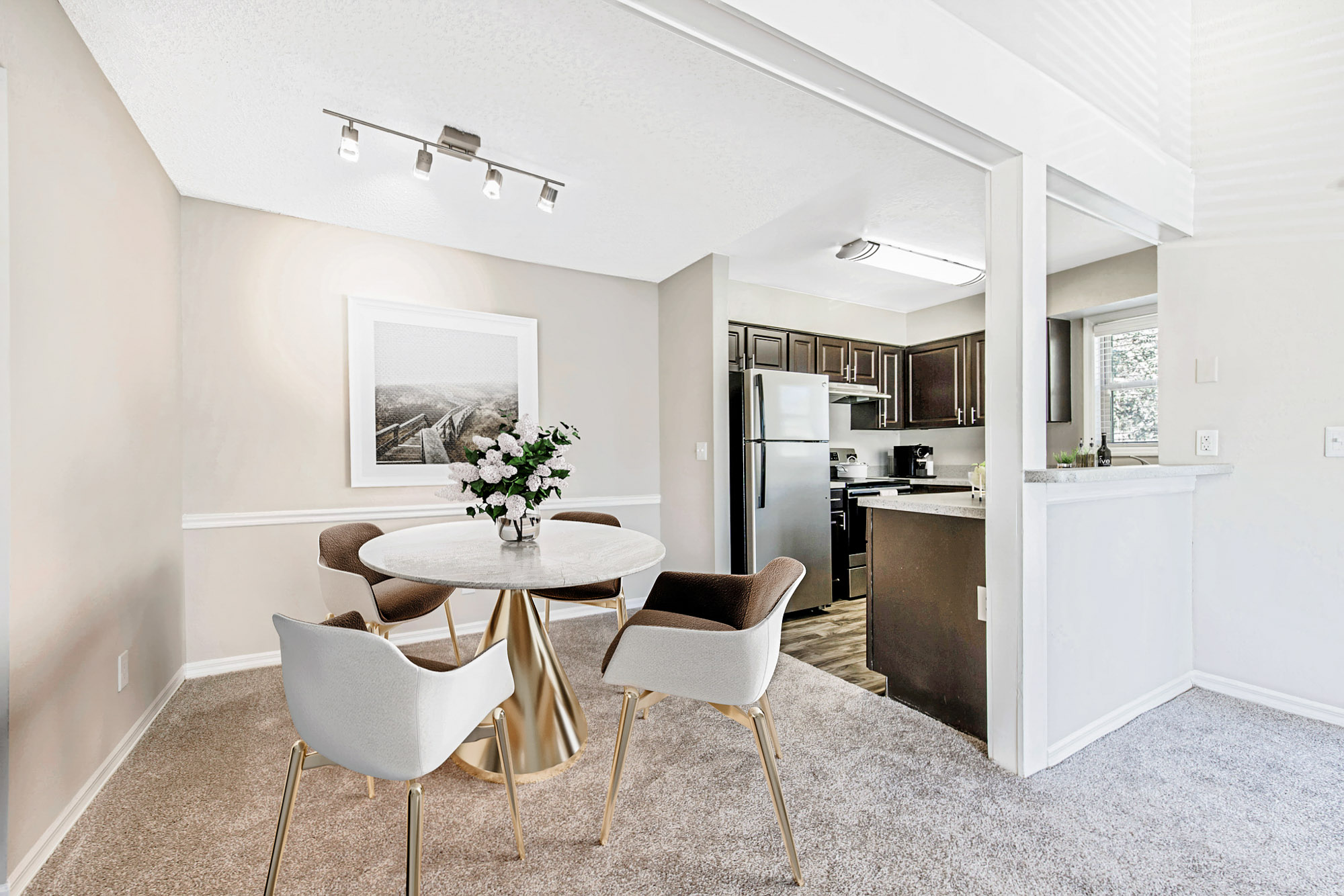 The interior of a dining area at Oak Ramble apartments in Tampa, FL.