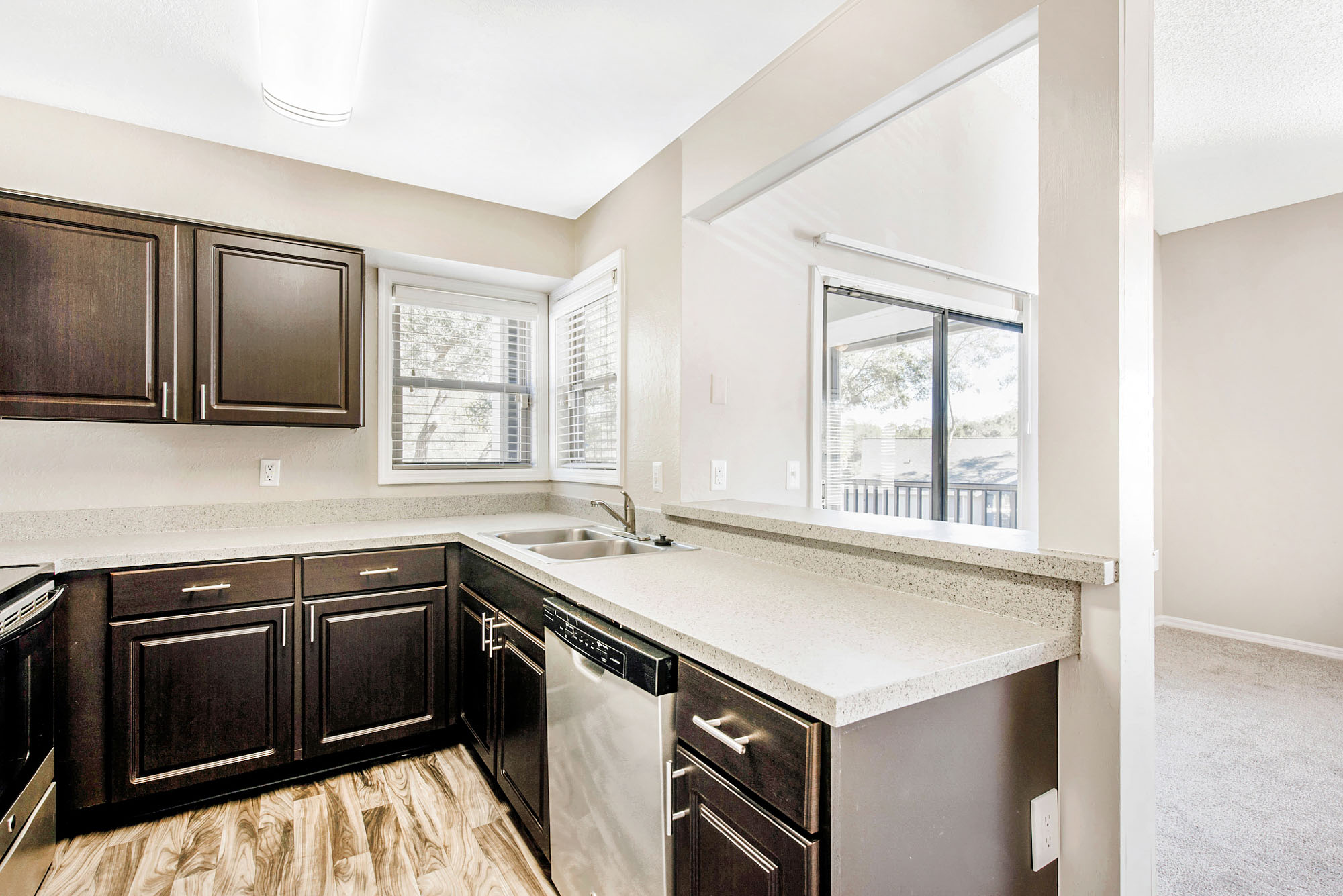 The interior of a kitchen at Oak Ramble apartments in Tampa, FL.