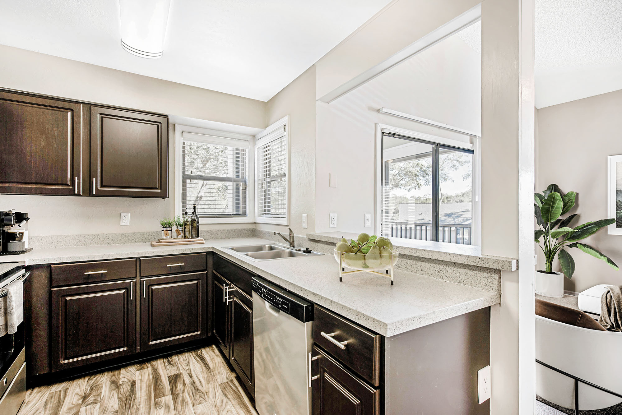 The interior of a kitchen at Oak Ramble apartments in Tampa, FL.