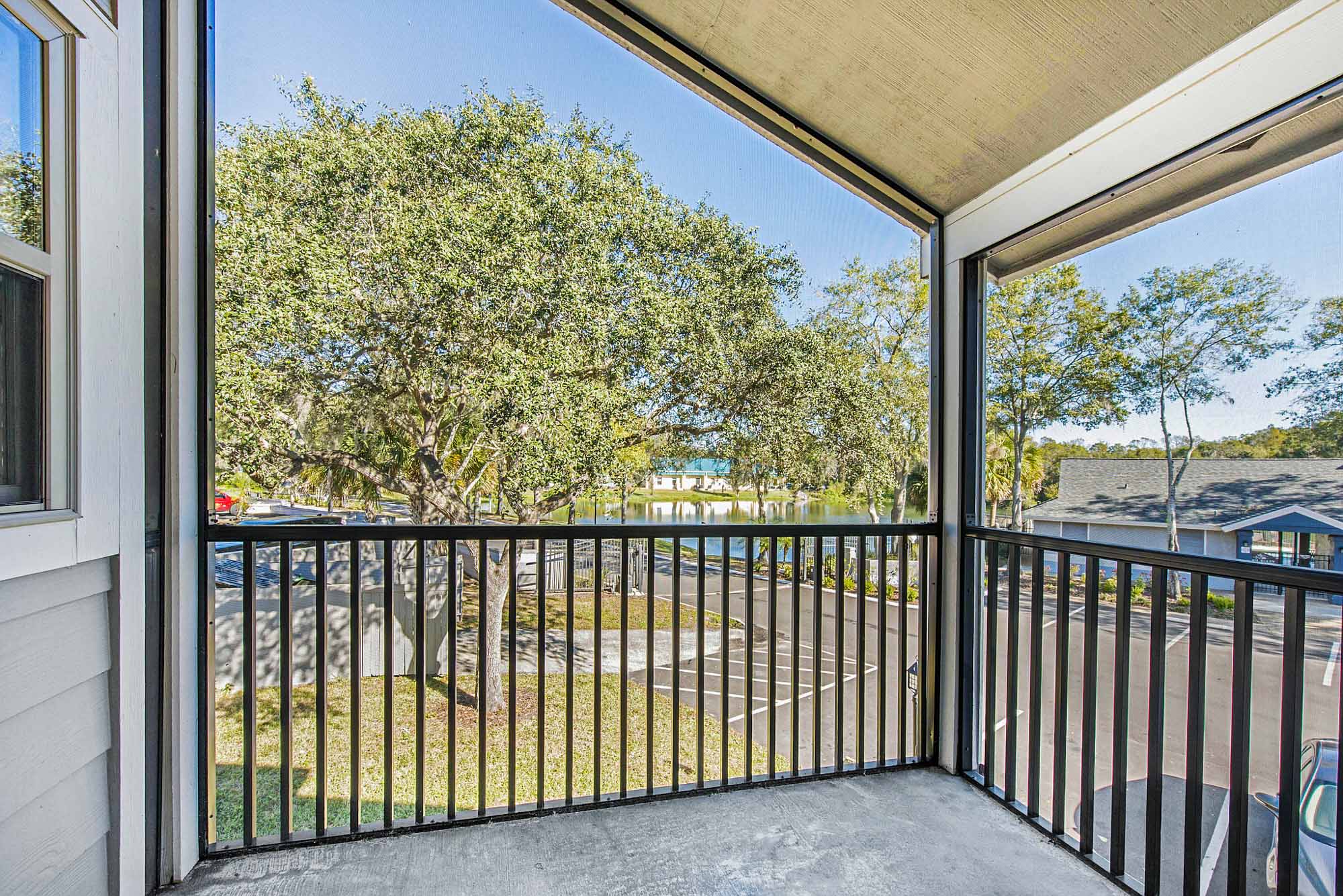 An attached balcony at Oak Ramble apartments in Tampa, FL.