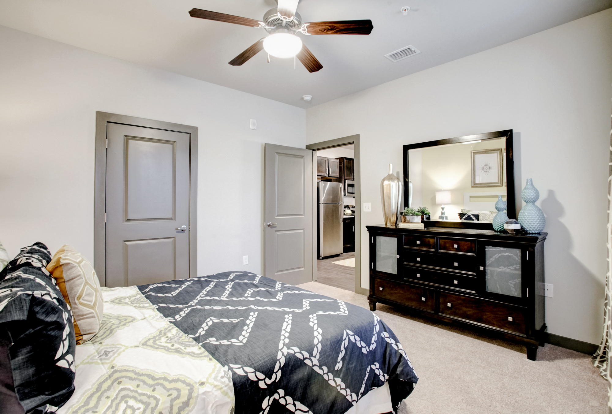 The bedroom of an apartment at Park 9 in Woodstock, GA.