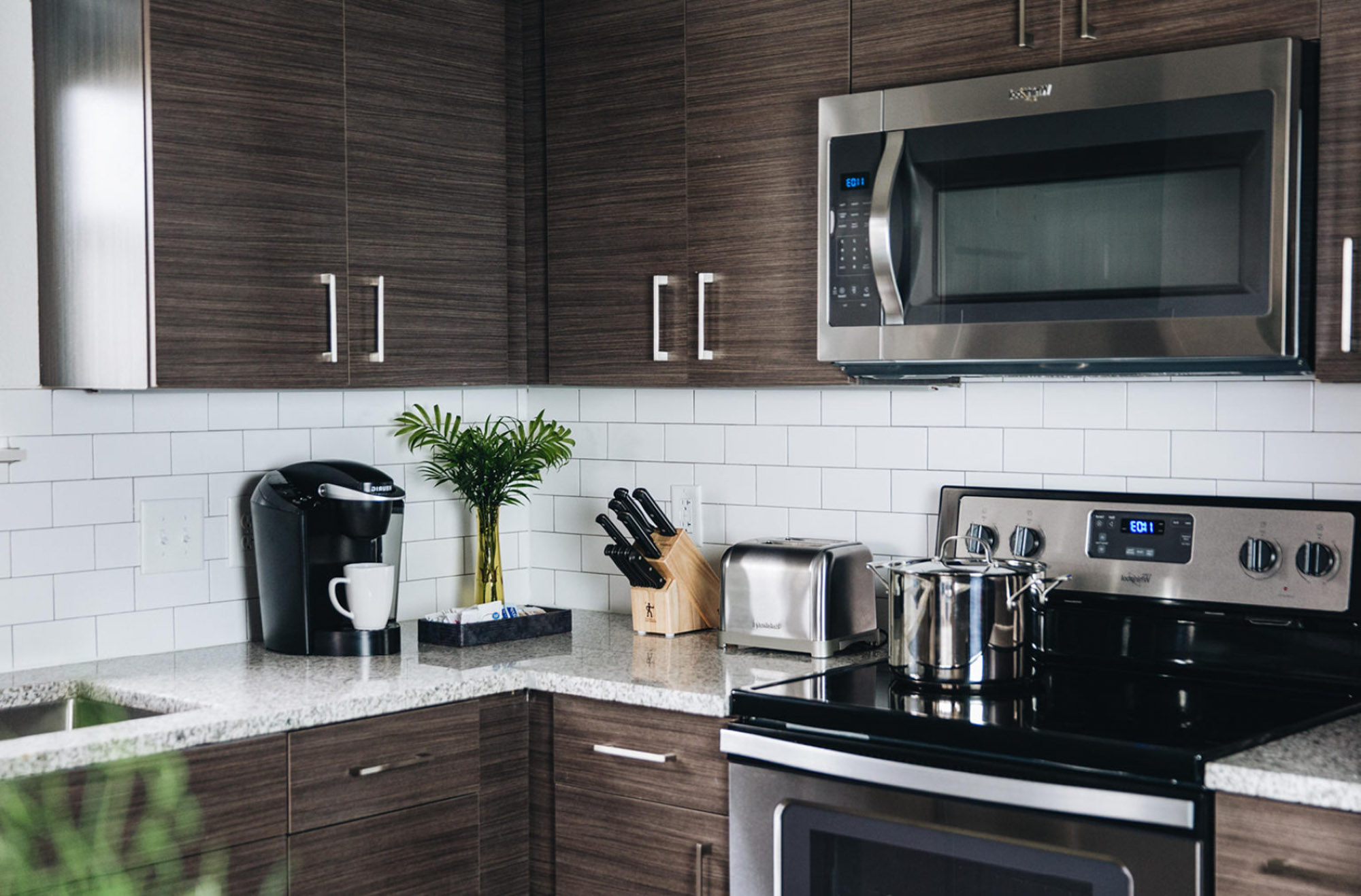 A kitchen in Domain apartments in Kissimmee, Florida.