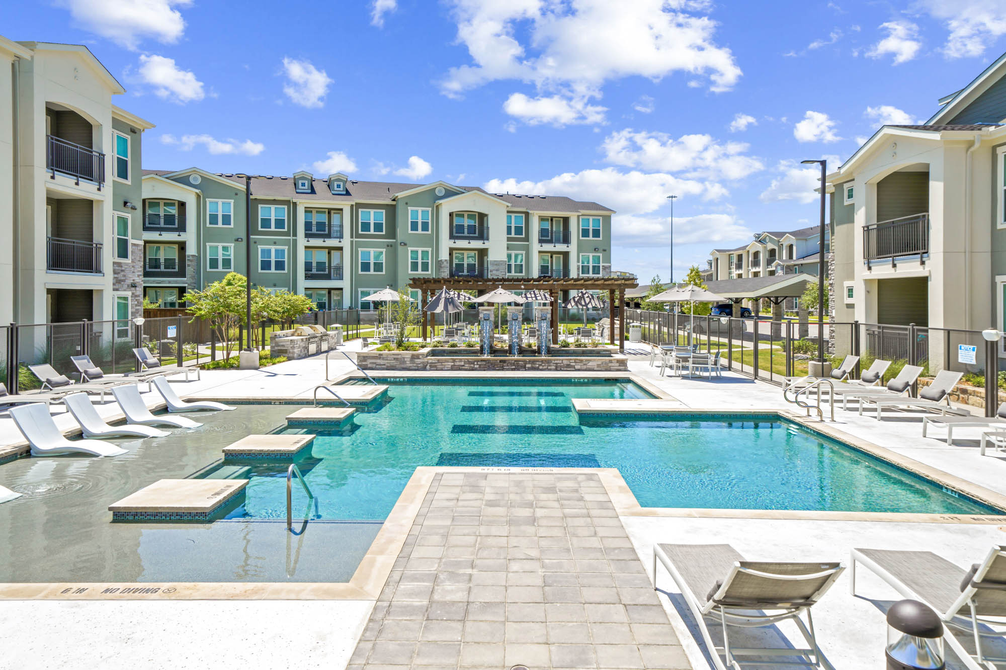 The pool at Embree Hill apartments in Dallas, TX.