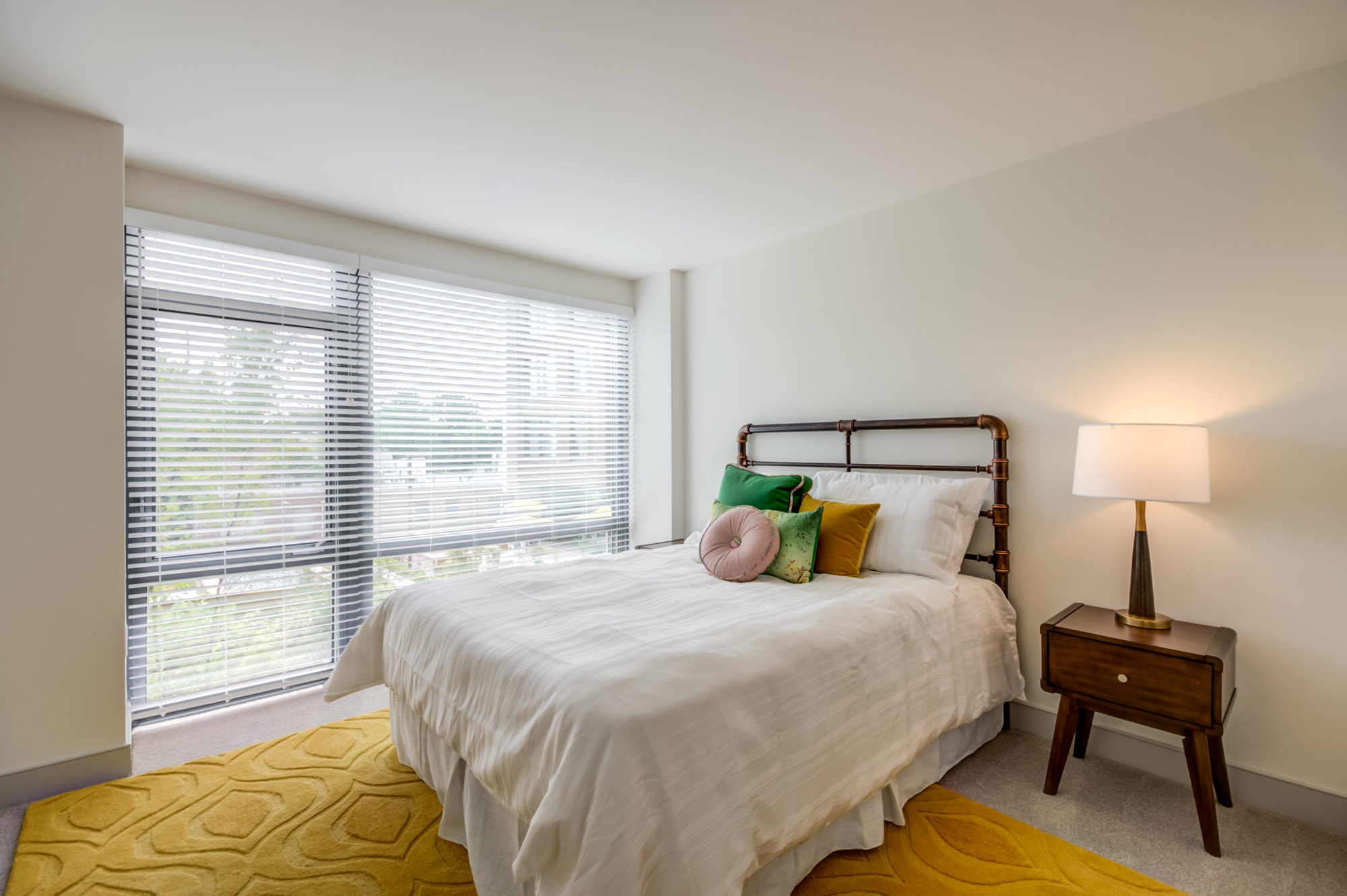 The bedroom in a Thayer and Spring apartment in downtown Silver Spring.