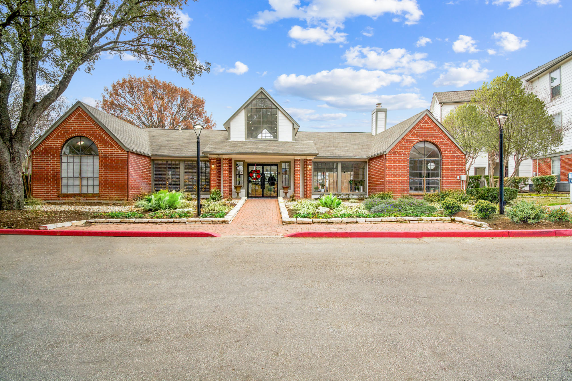 The clubhouse at The Arbors of Wells Branch apartments in Austin, TX.