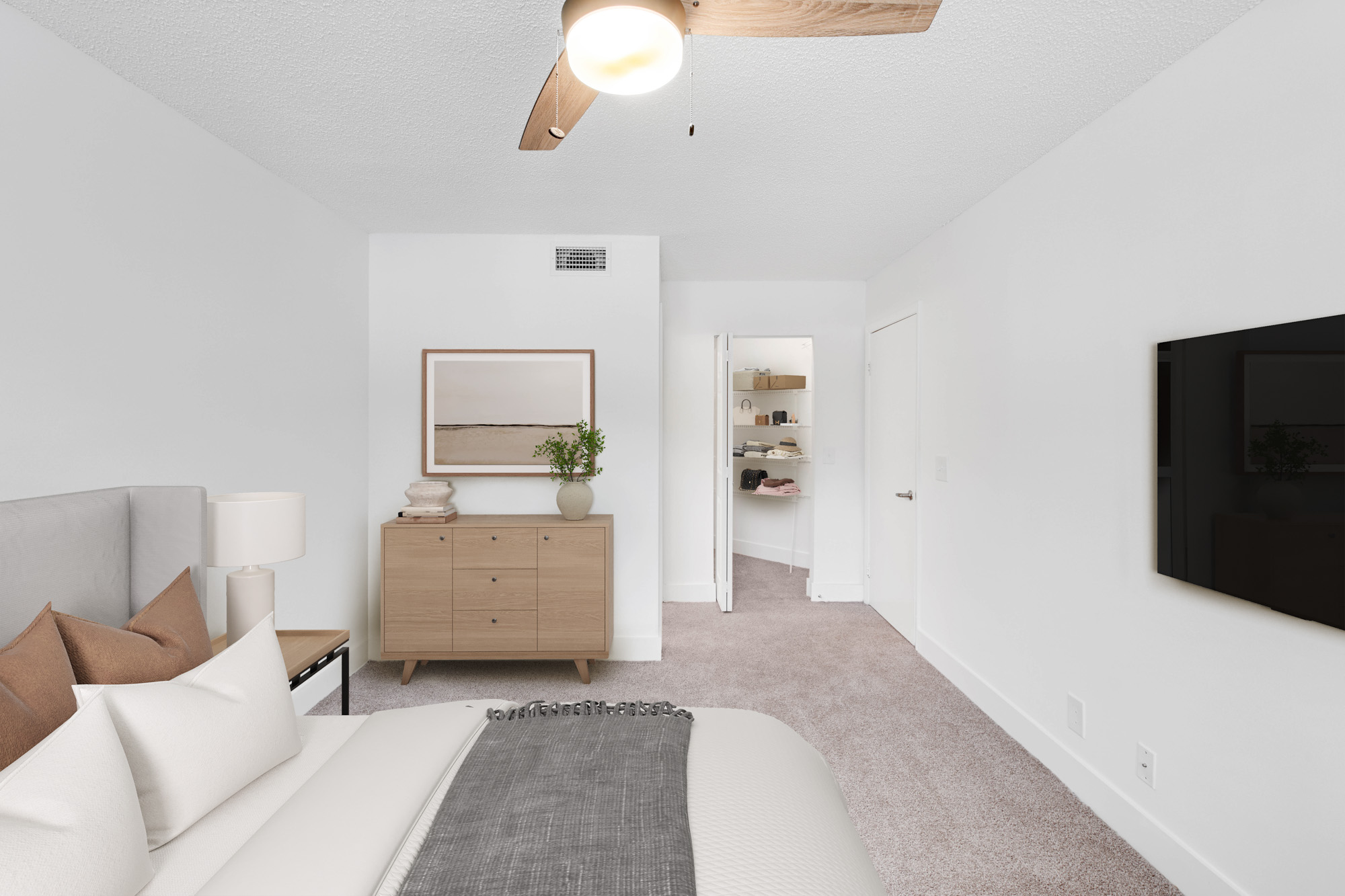 The interior of a bedroom at The Reserve at Ashely Lake apartments.