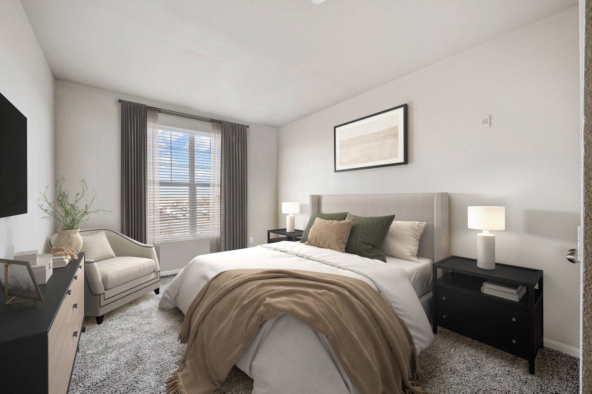 A bedroom in an apartment at The Village at Legacy Ridge near Denver, Colorado.