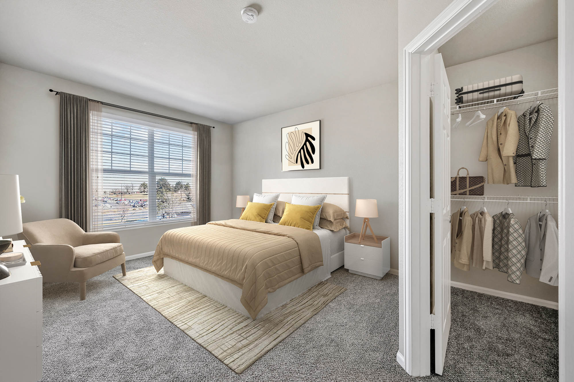 A bedroom in an apartment at The Village at Legacy Ridge near Denver, Colorado.