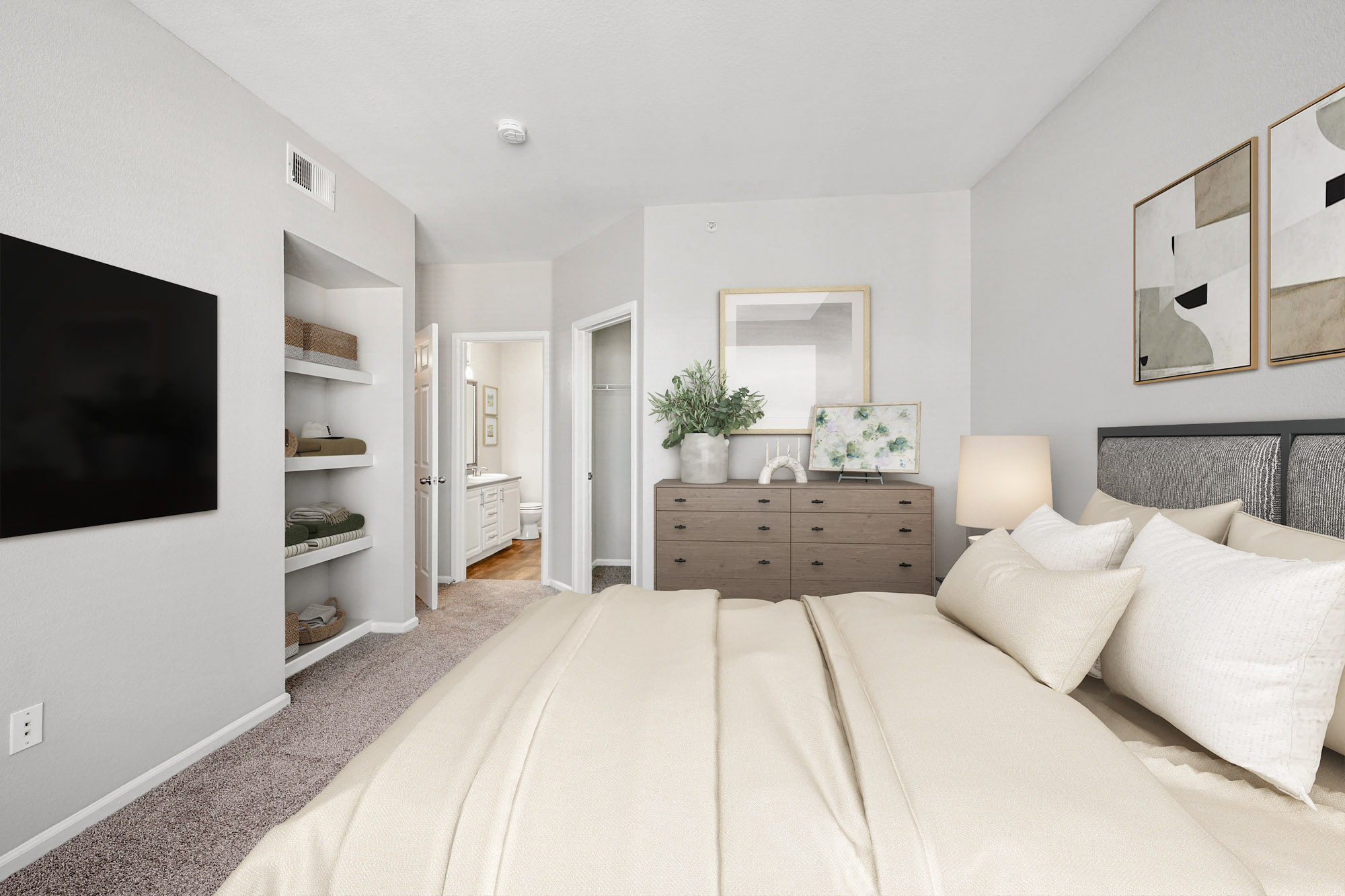 A bedroom in an apartment at The Village at Legacy Ridge near Denver, Colorado.