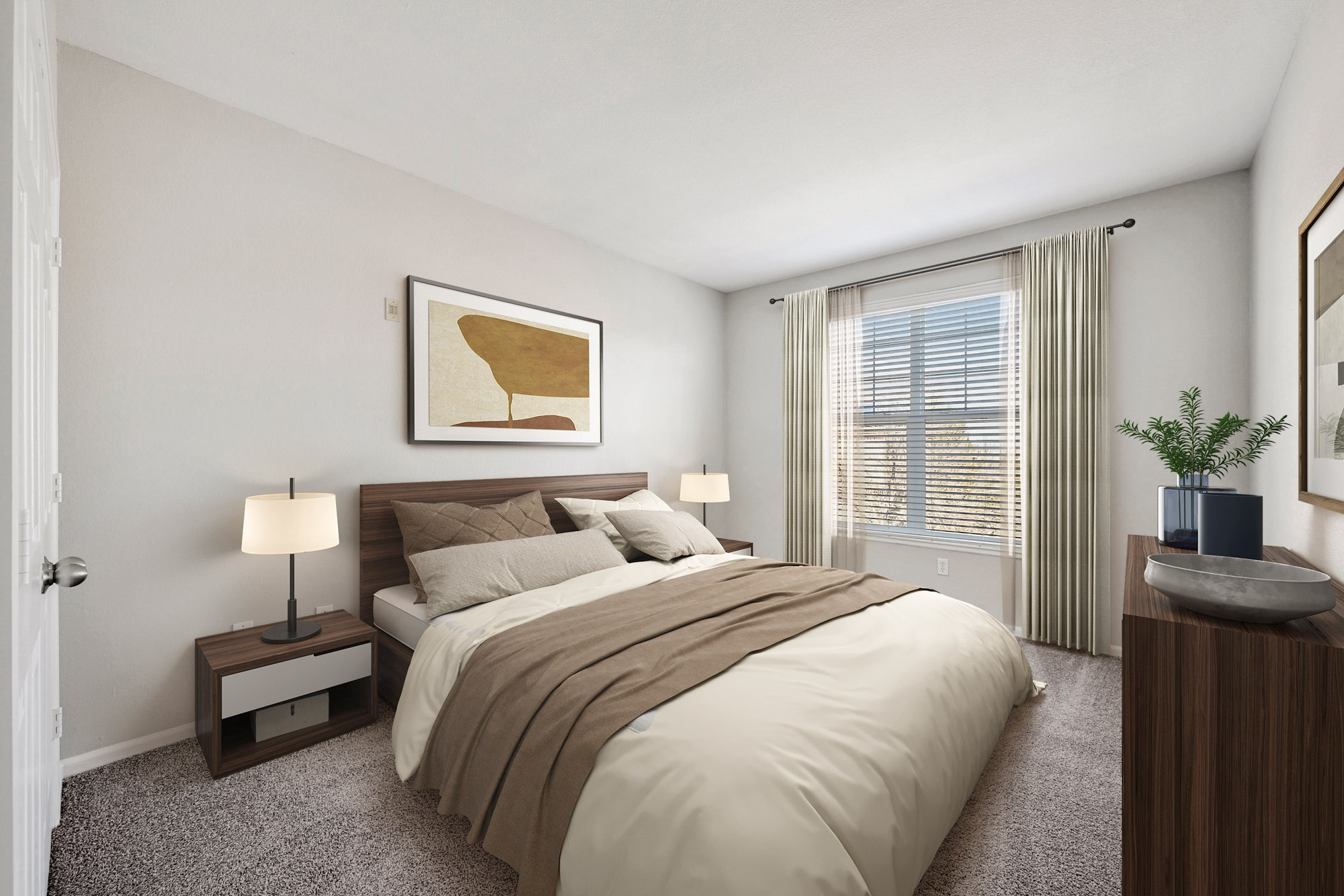 A bedroom in an apartment at The Village at Legacy Ridge near Denver, Colorado.