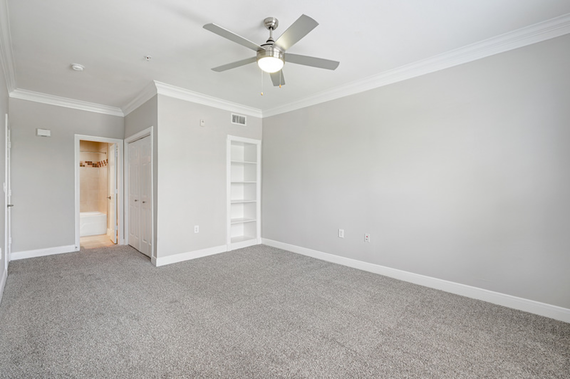 The bedroom in a Village on Memorial townhouse in Houston, TX.