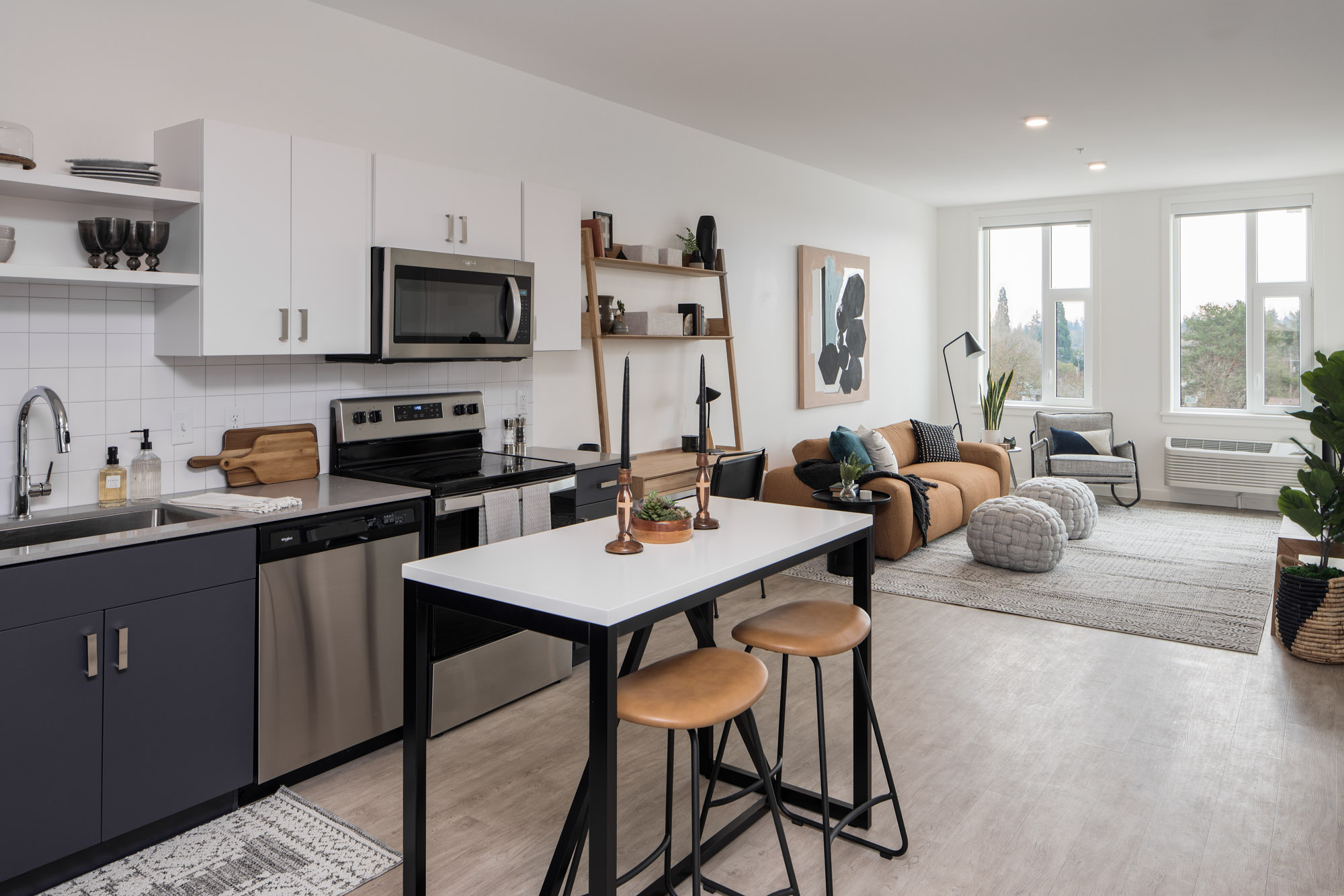 A kitchen and living room in Verso apartments in Beaverton, Oregon.