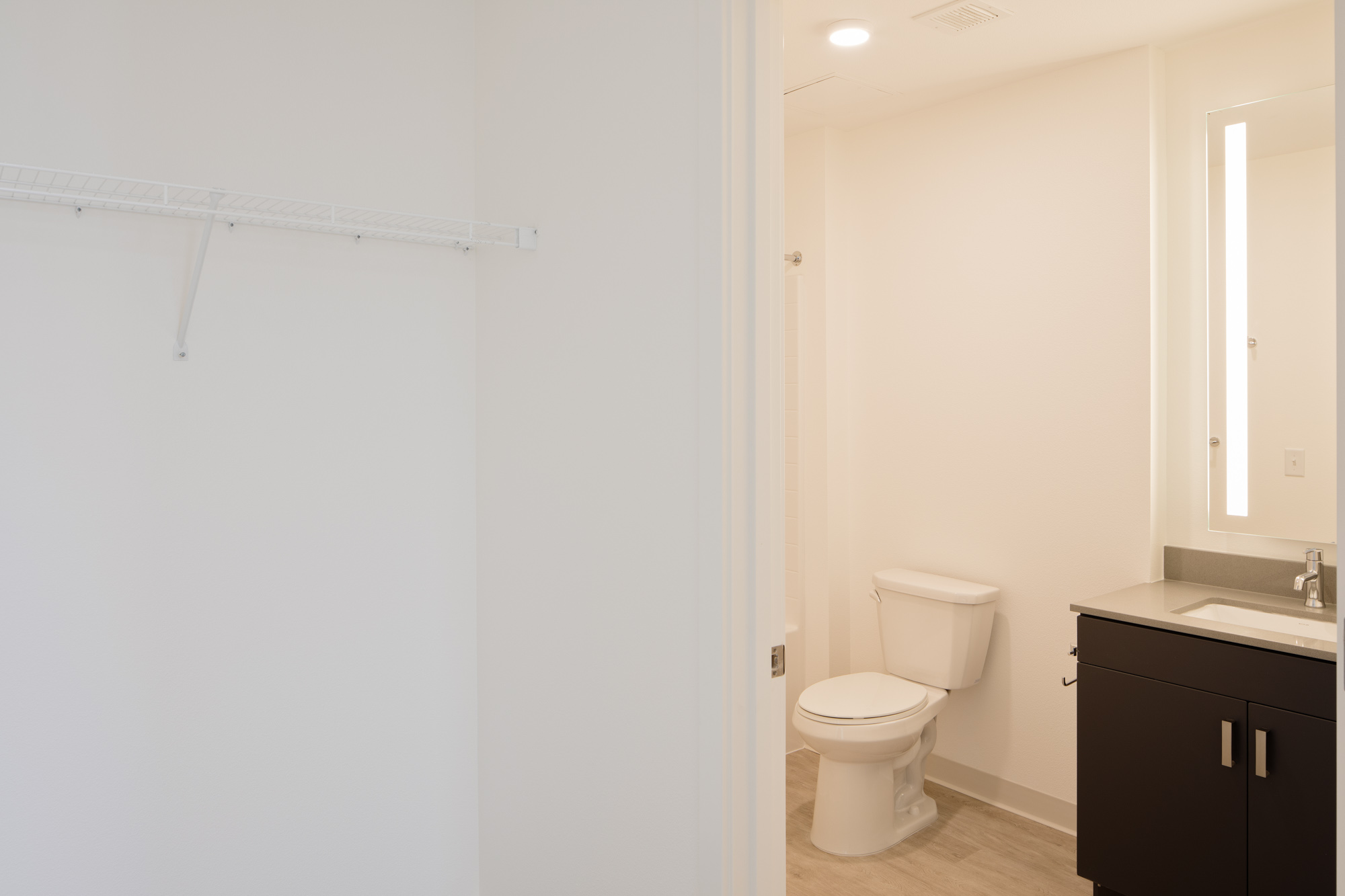 A closet and bathroom in Verso apartments in Beaverton, Oregon.