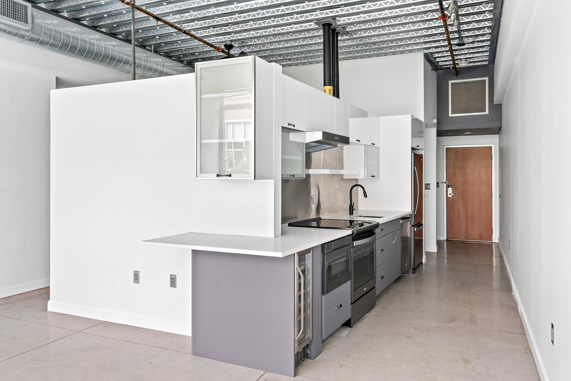 Kitchen at Loft23 apartments in University Park in Cambridge, MA