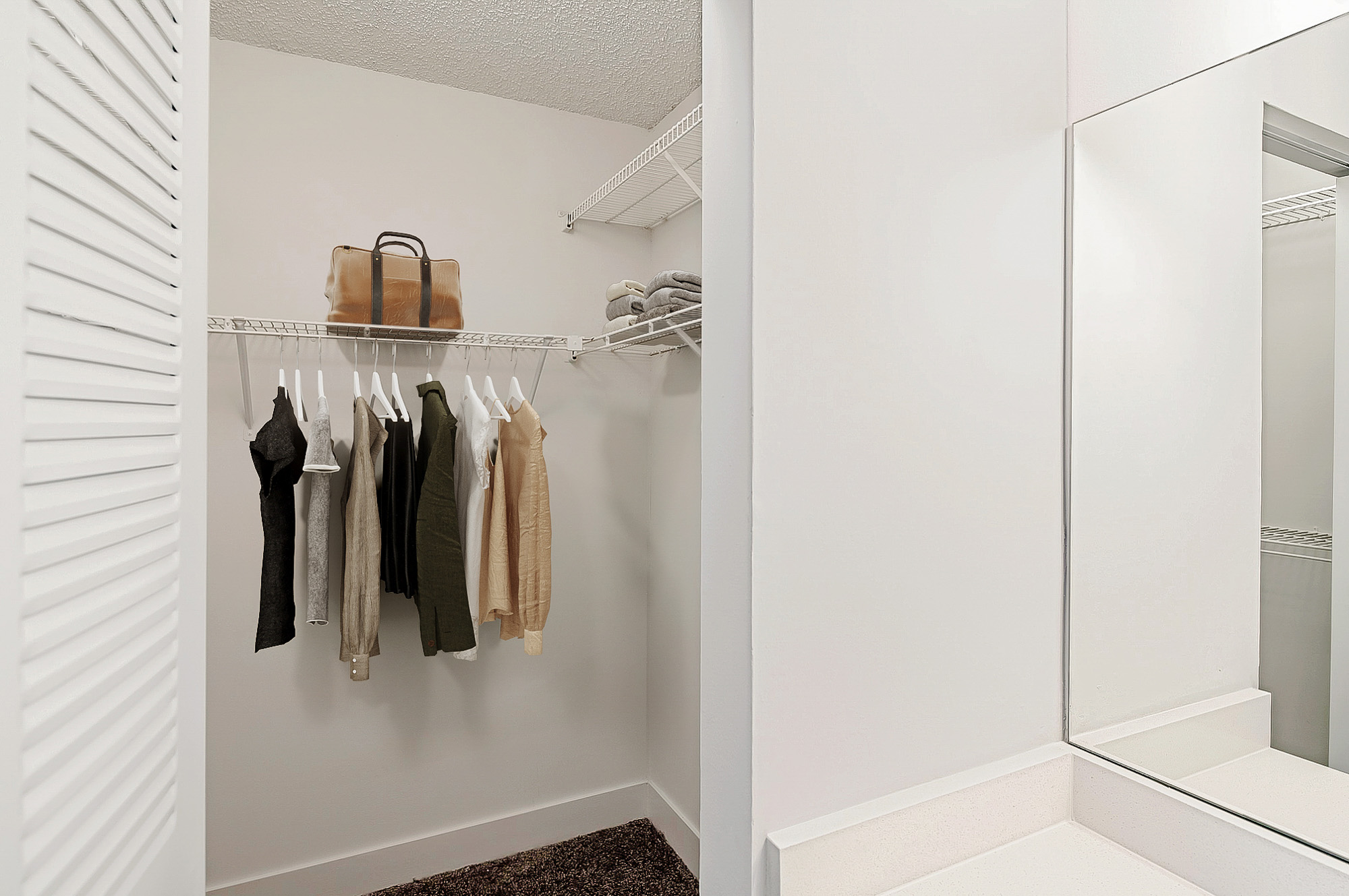 The interior of a closet at The Reserve at Ashely Lake apartments.