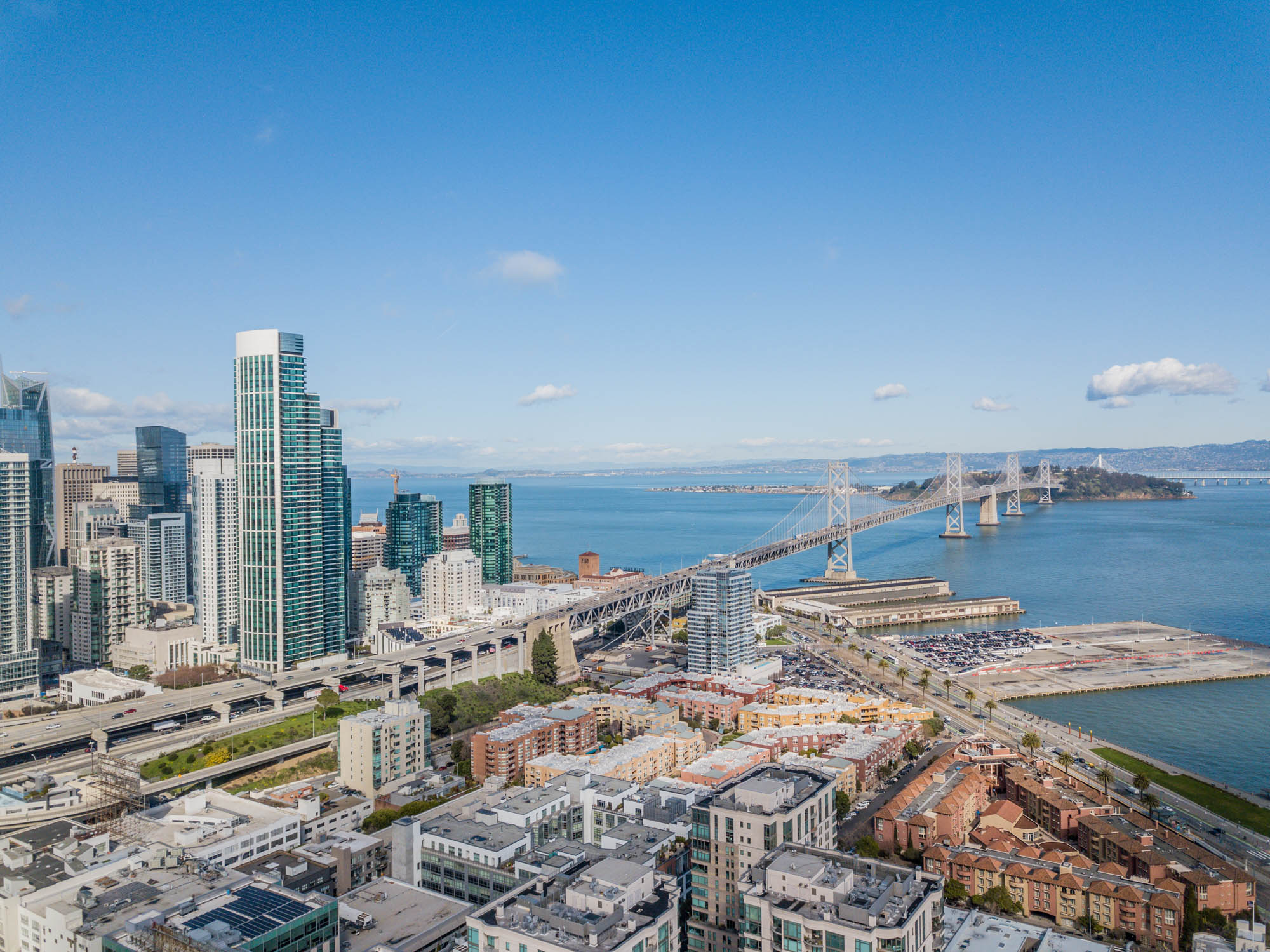 The San Francisco skyline, with a view of the bay bridge in a neighborhood near Bayside Villages modern apartments in downtown San Francisco