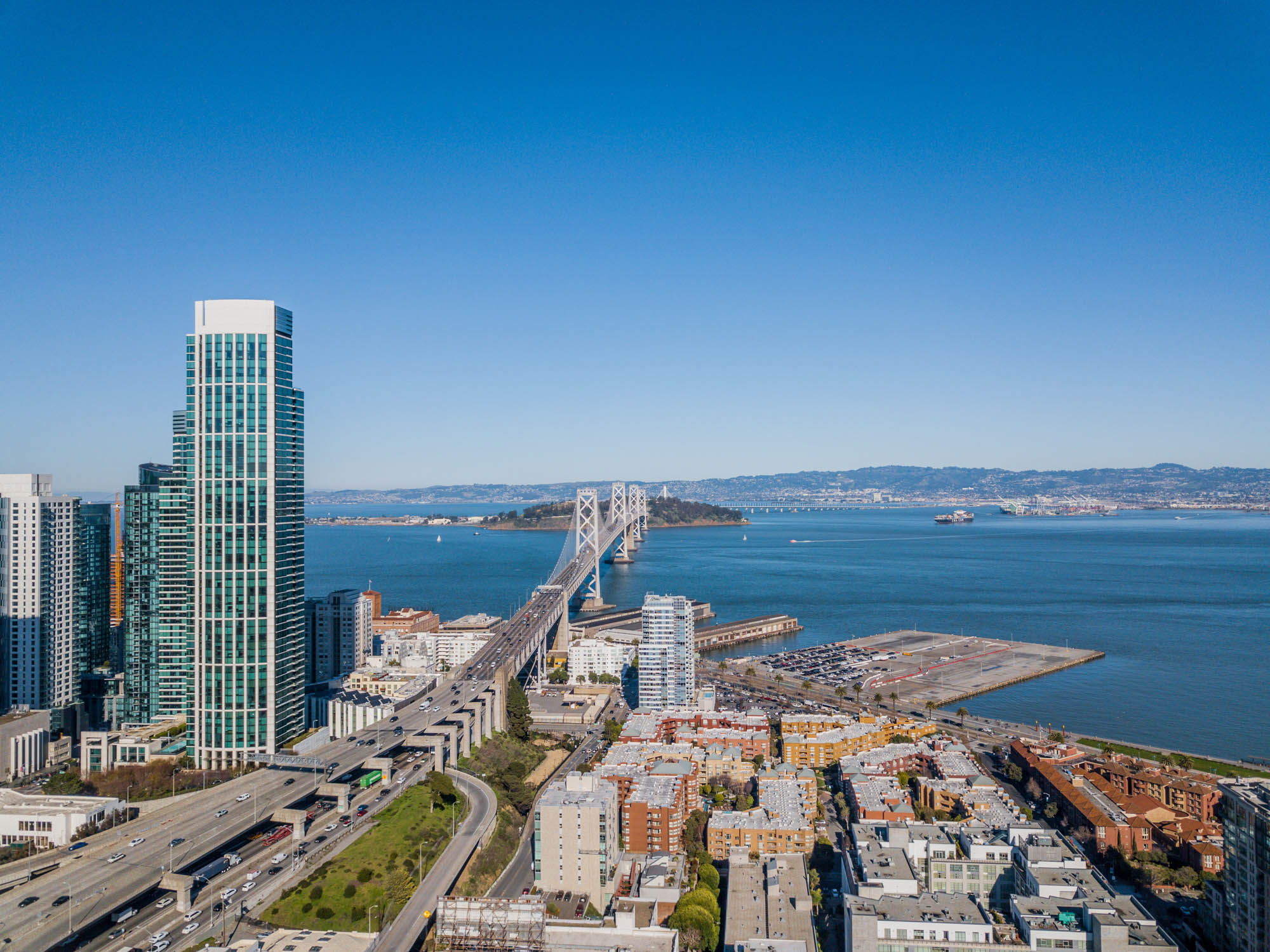The San Francisco skyline, with a view of the bay bridge in a neighborhood near Bayside Villages modern apartments in downtown San Francisco
