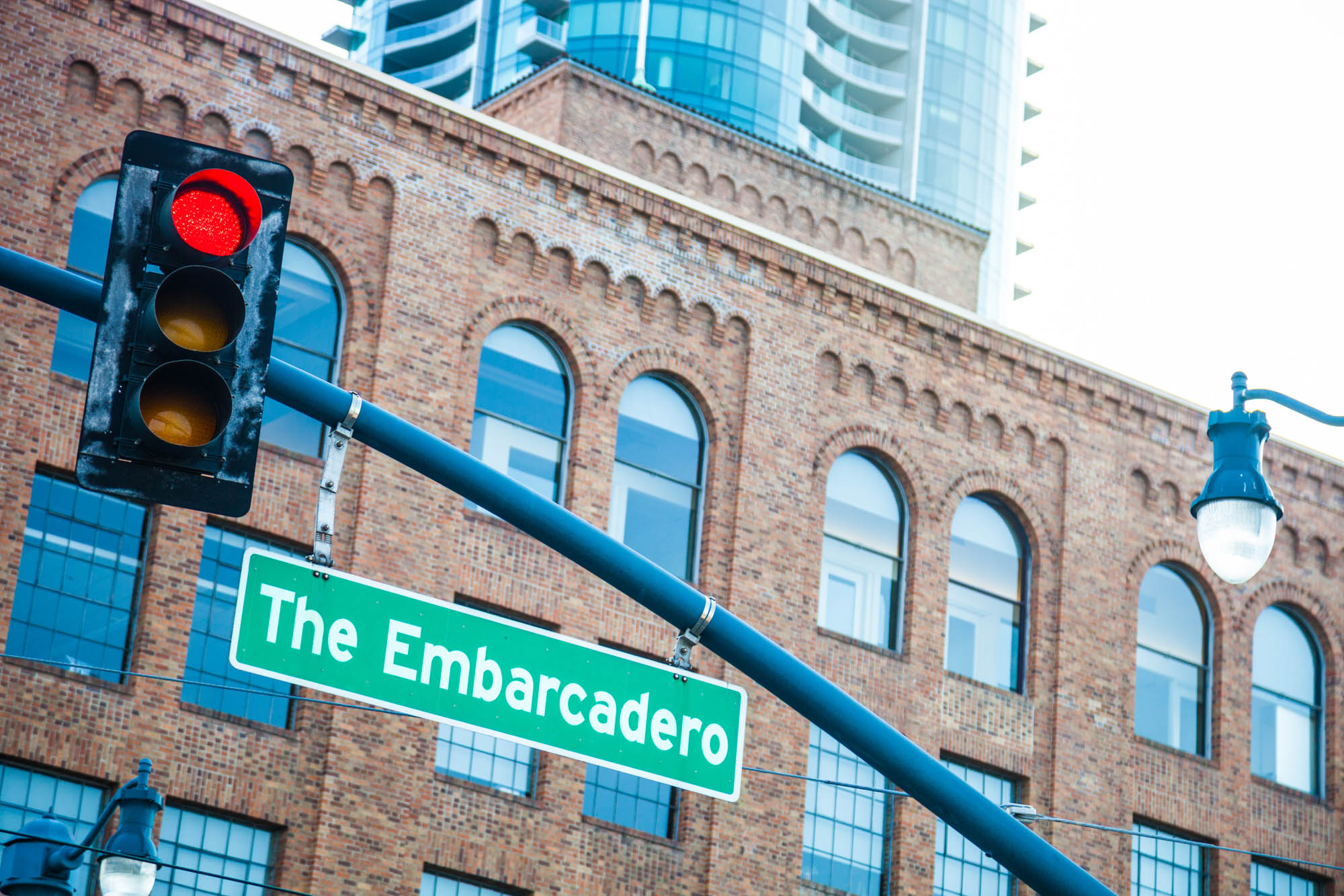 An image of a street light and 'The Embarcadero' street sign in downtown San Francisco