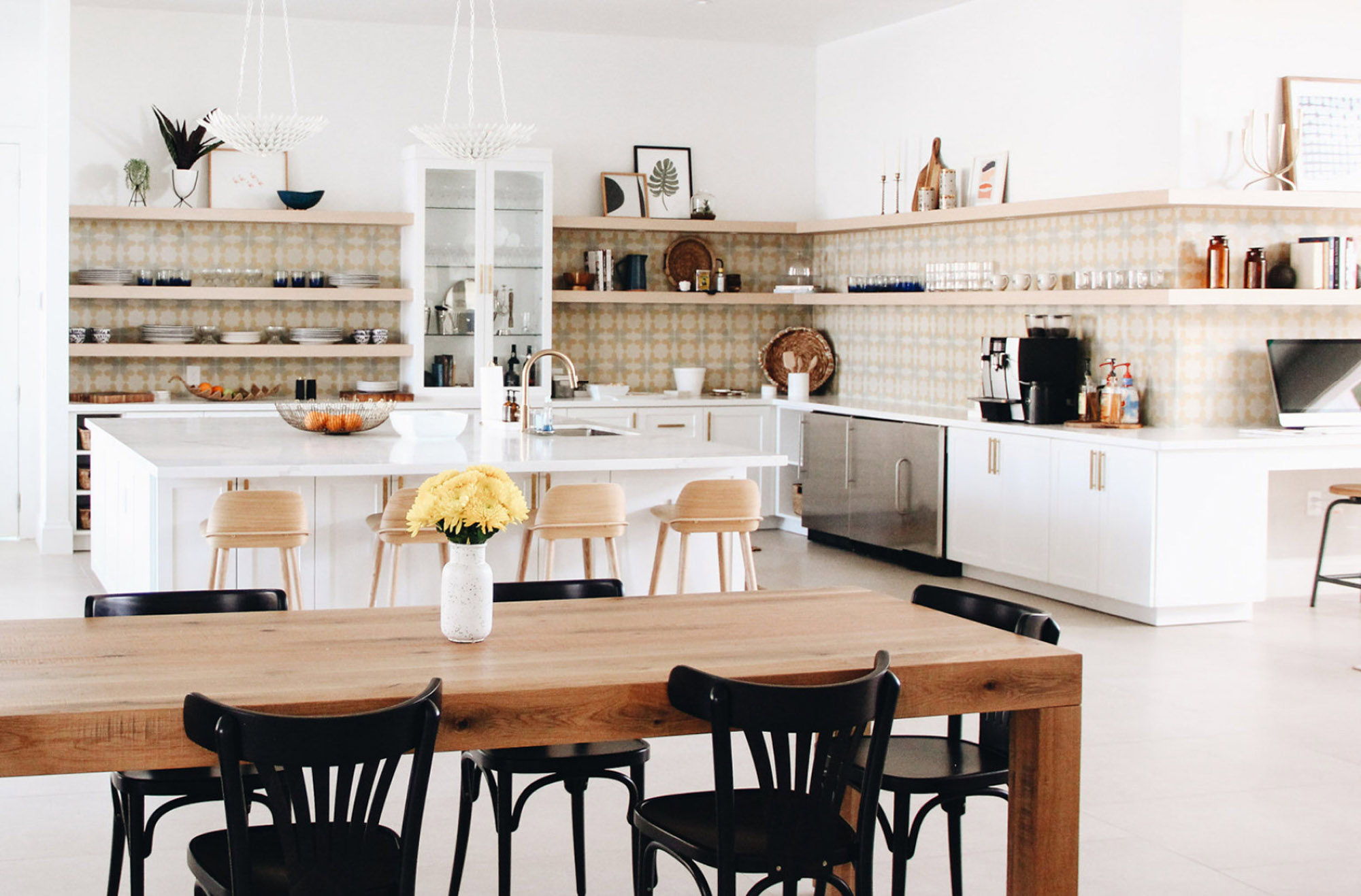 The clubhouse kitchen and dining area at Domain apartments in Kissimmee, Florida.