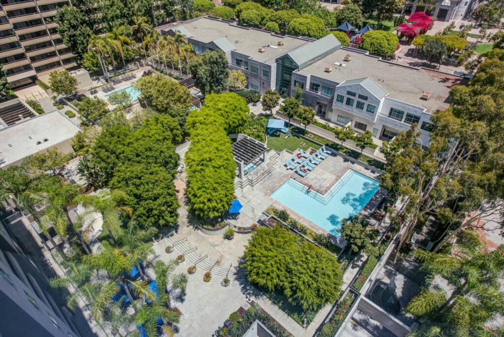 An aerial view of The Met apartments and its pool area in downtown Los Angeles, California.
