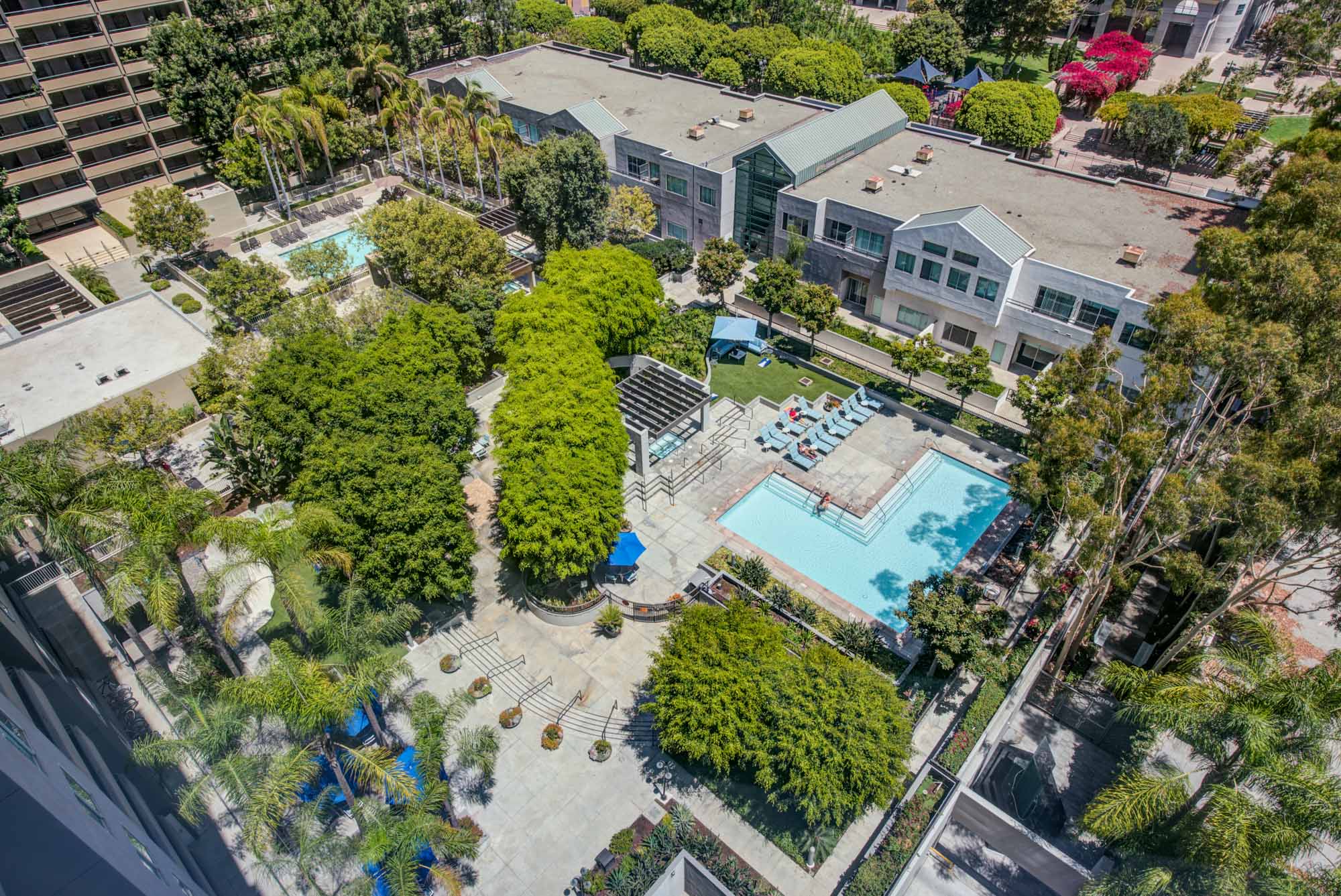 An aerial view of The Met apartments and its pool area in downtown Los Angeles, California.