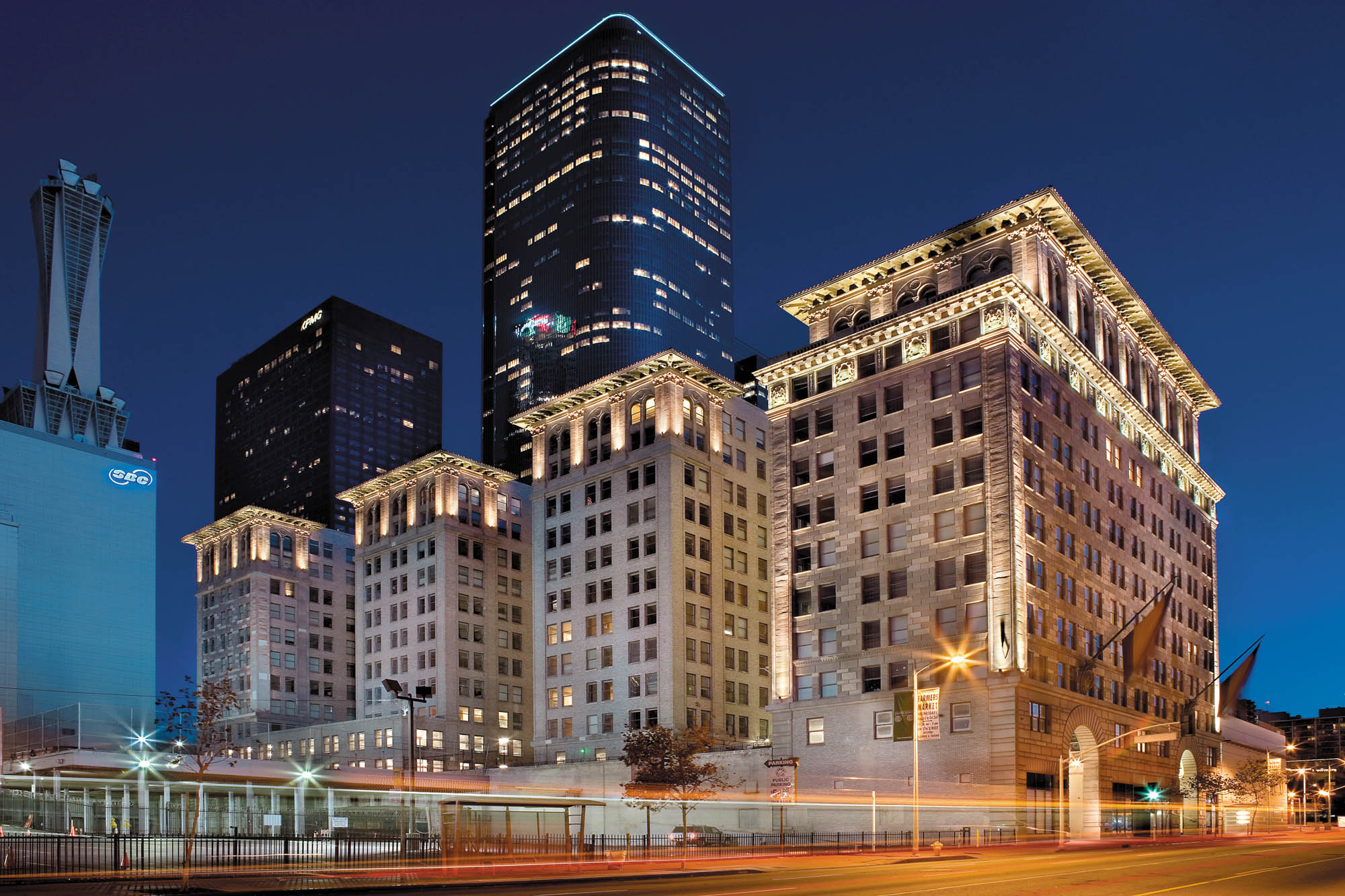 The Metro 417 apartment buildings next to a vibrant streets and metro of downtown LA
