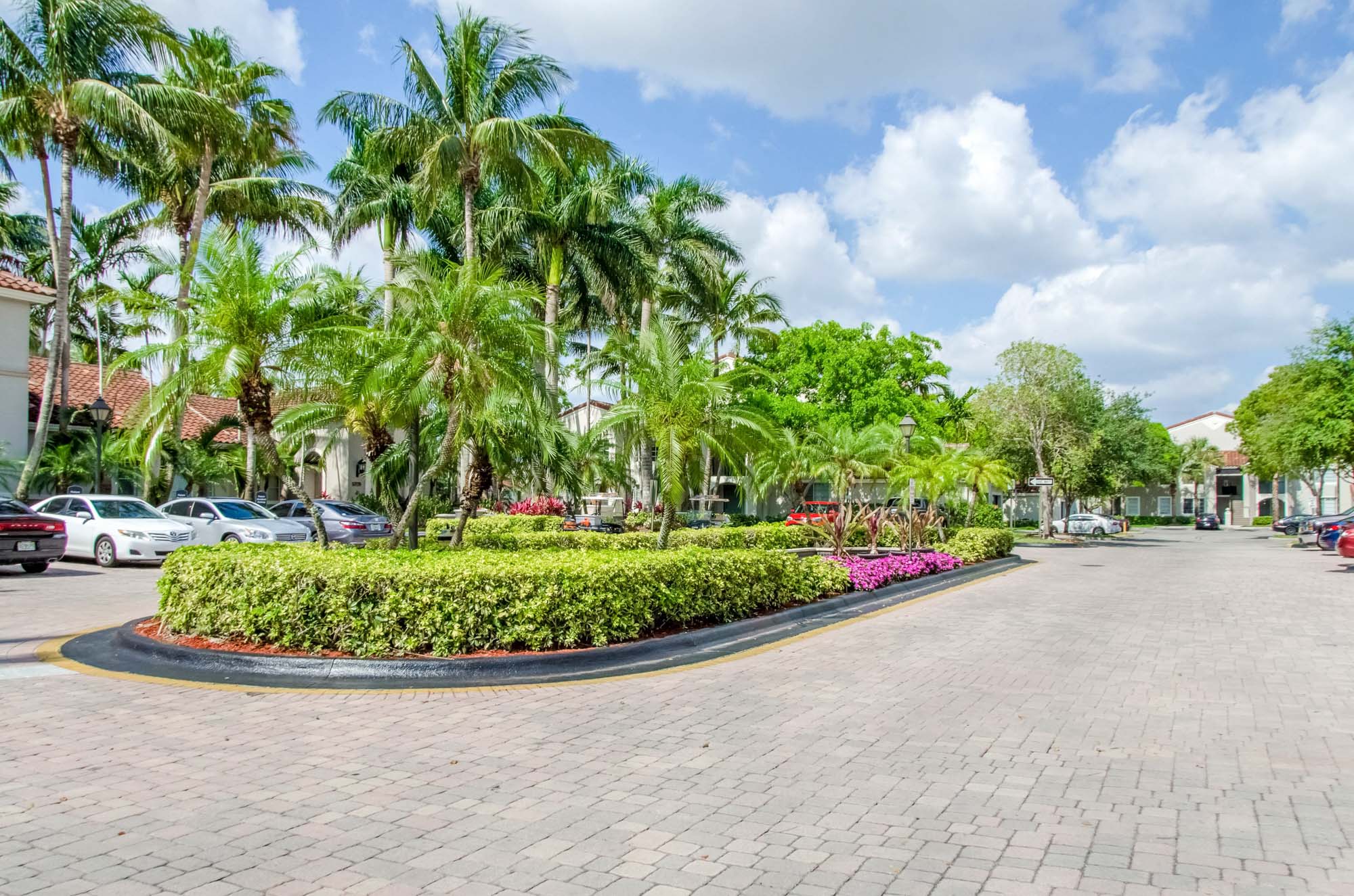 A driveway to the main office at Miramar Lake apartments in Fort Lauderdale, FL.