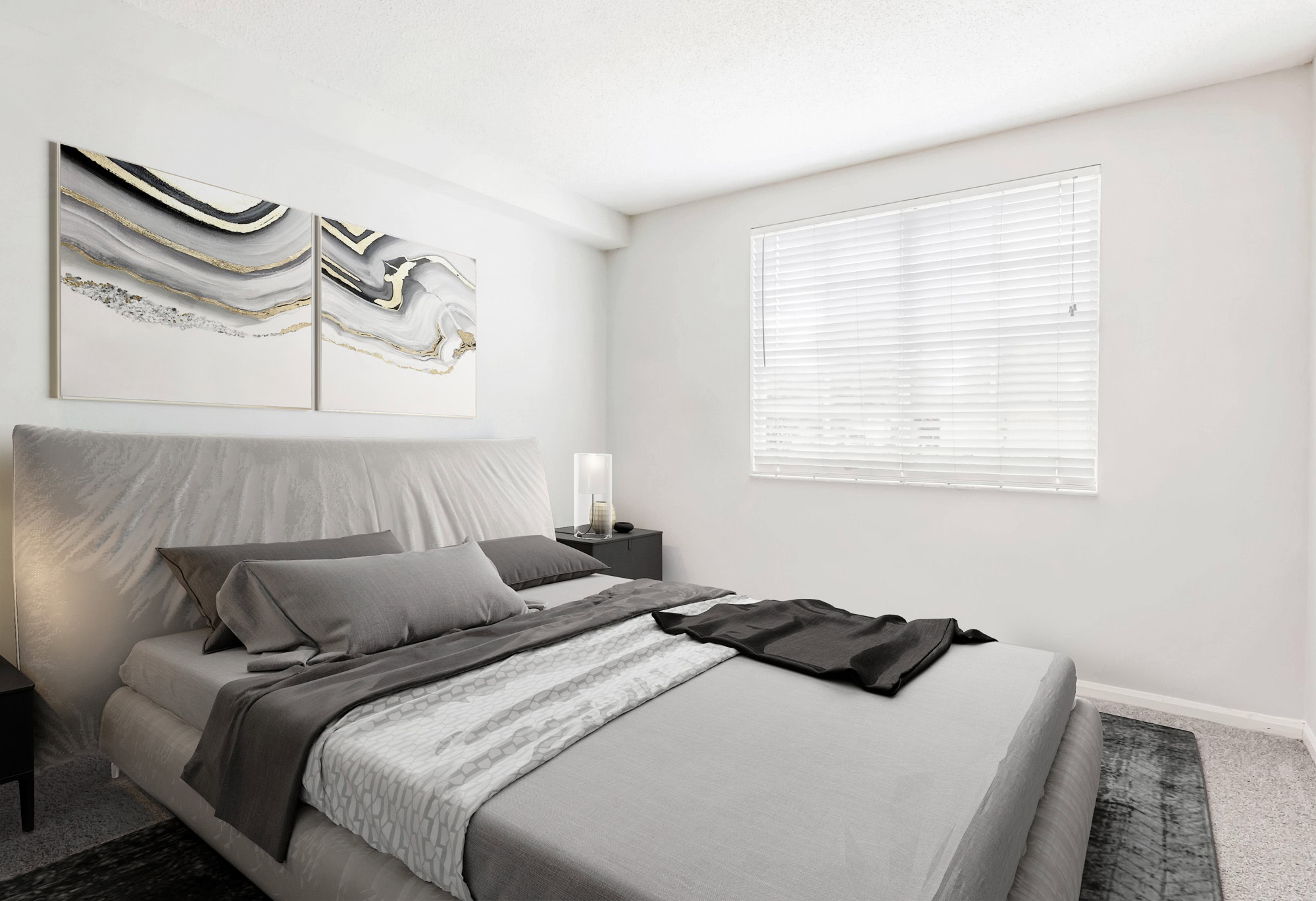 A bedroom in a Miramar Lakes apartment in Fort Lauderdale, FL