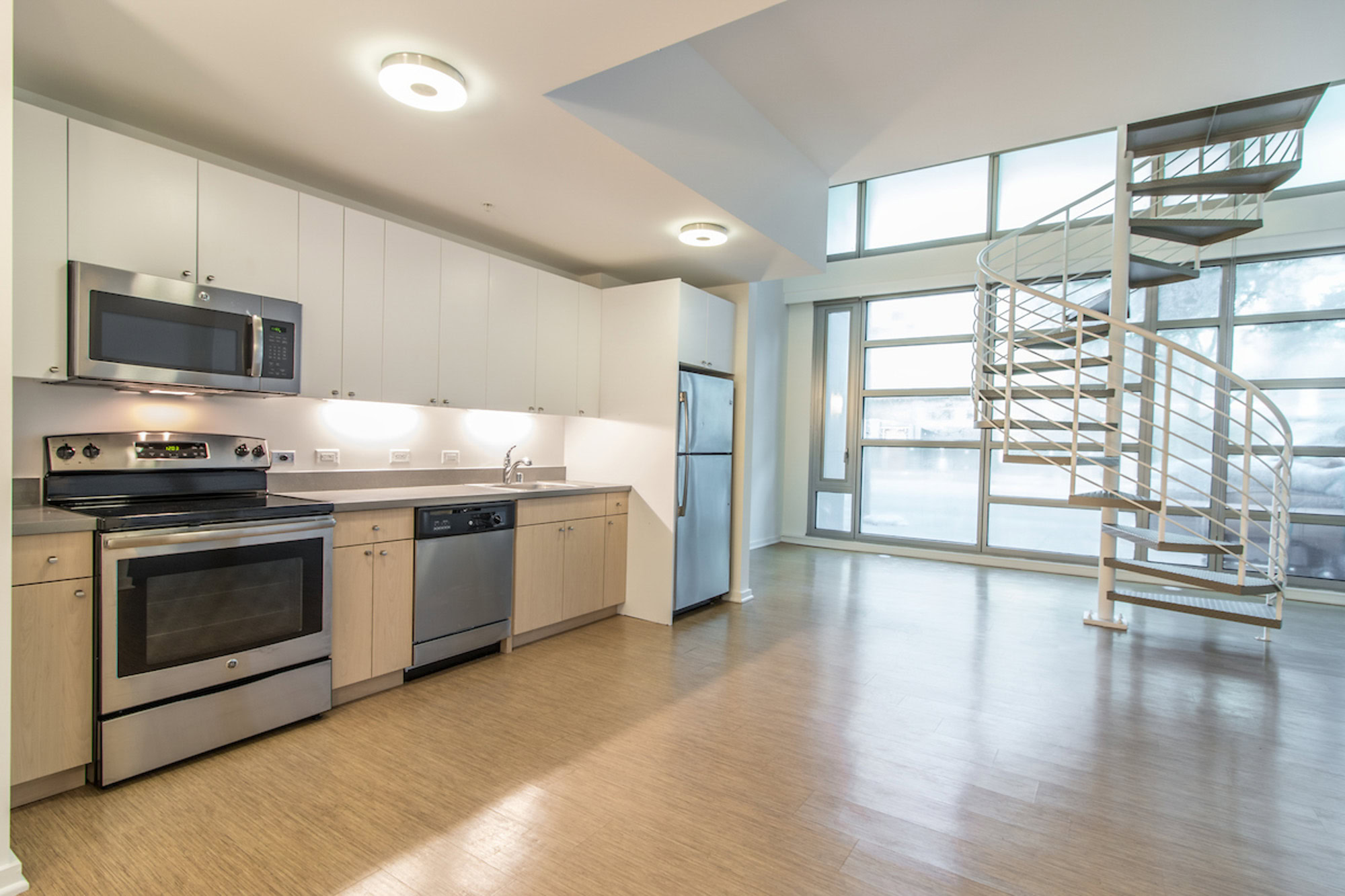 A kitchen in an open plan apartment in a Mosso apartment in San Francisco