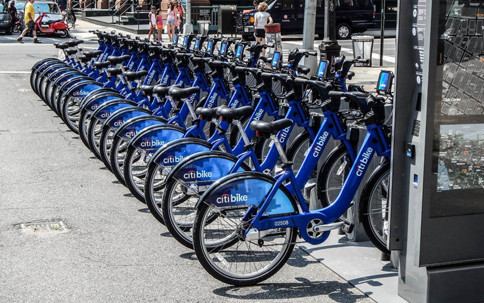 A row of citi bikes by 111 Worth apartments in New York, NY.