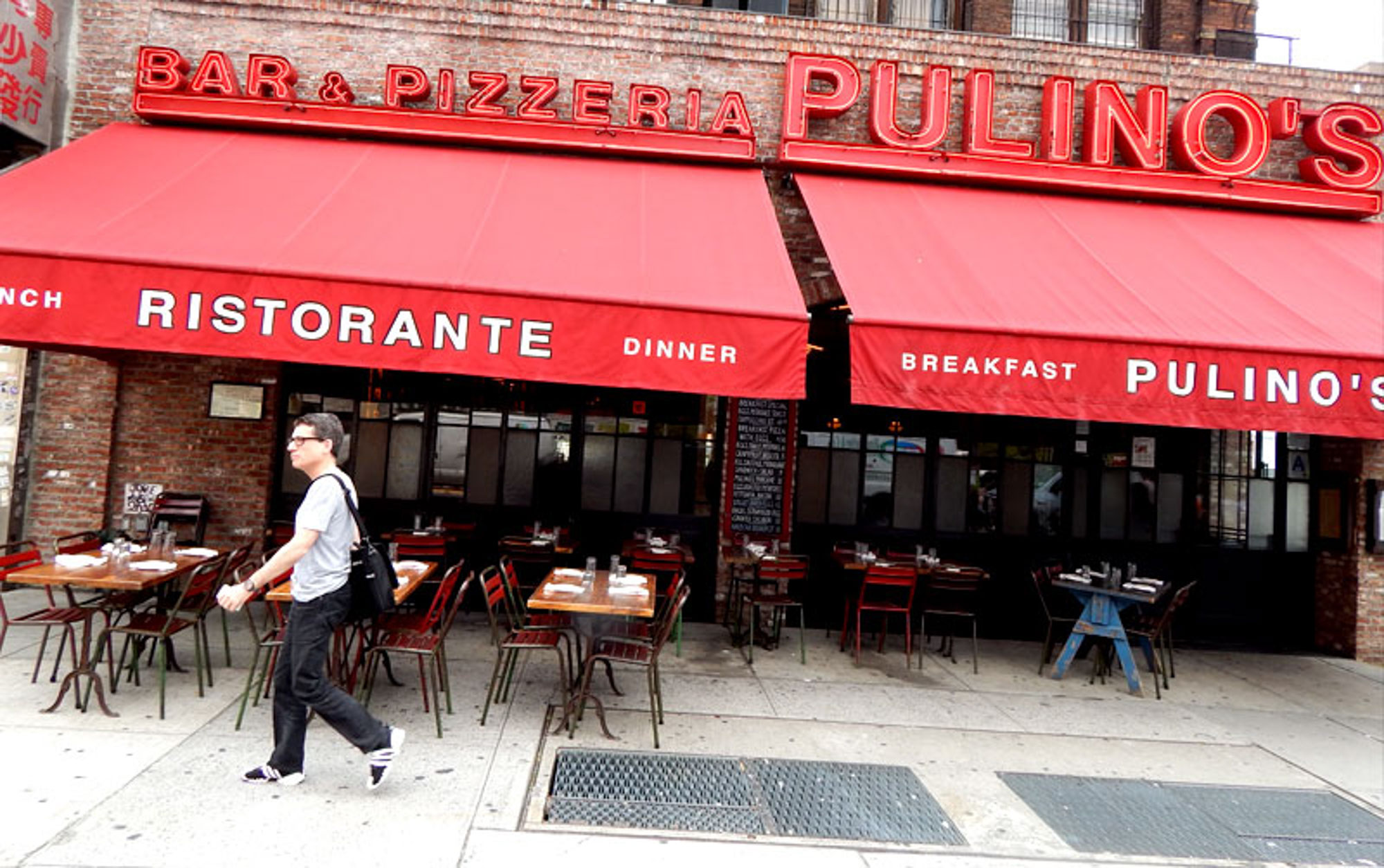 The storefront for Pulino's by 111 Worth apartments in New York, NY.