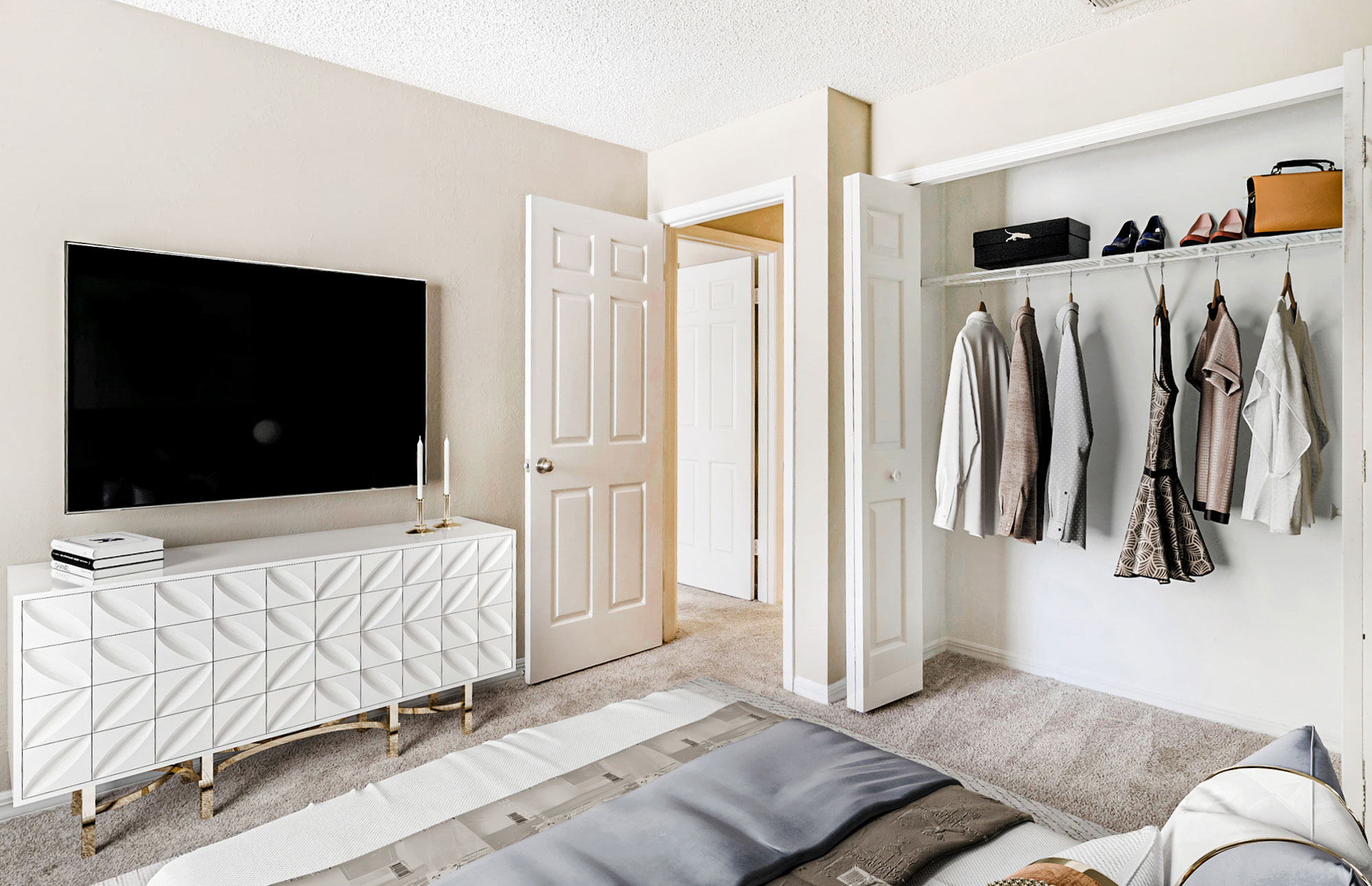 A bedroom with a wide closet at Oak Ramble apartments in Tampa, FL.