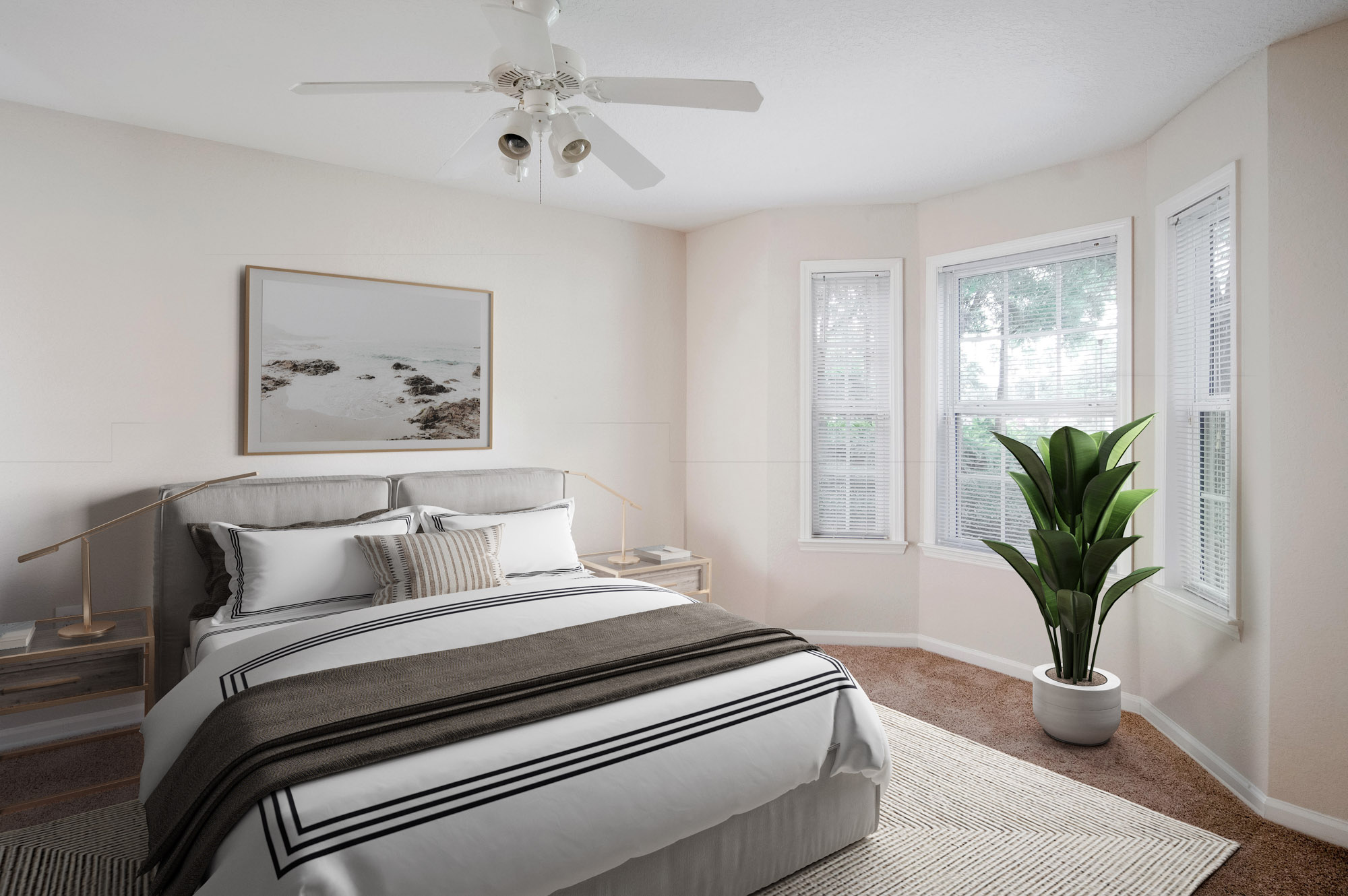 The bedroom in a luxury apartment at Osprey Links at Hunter's Creek in Orlando, Florida.