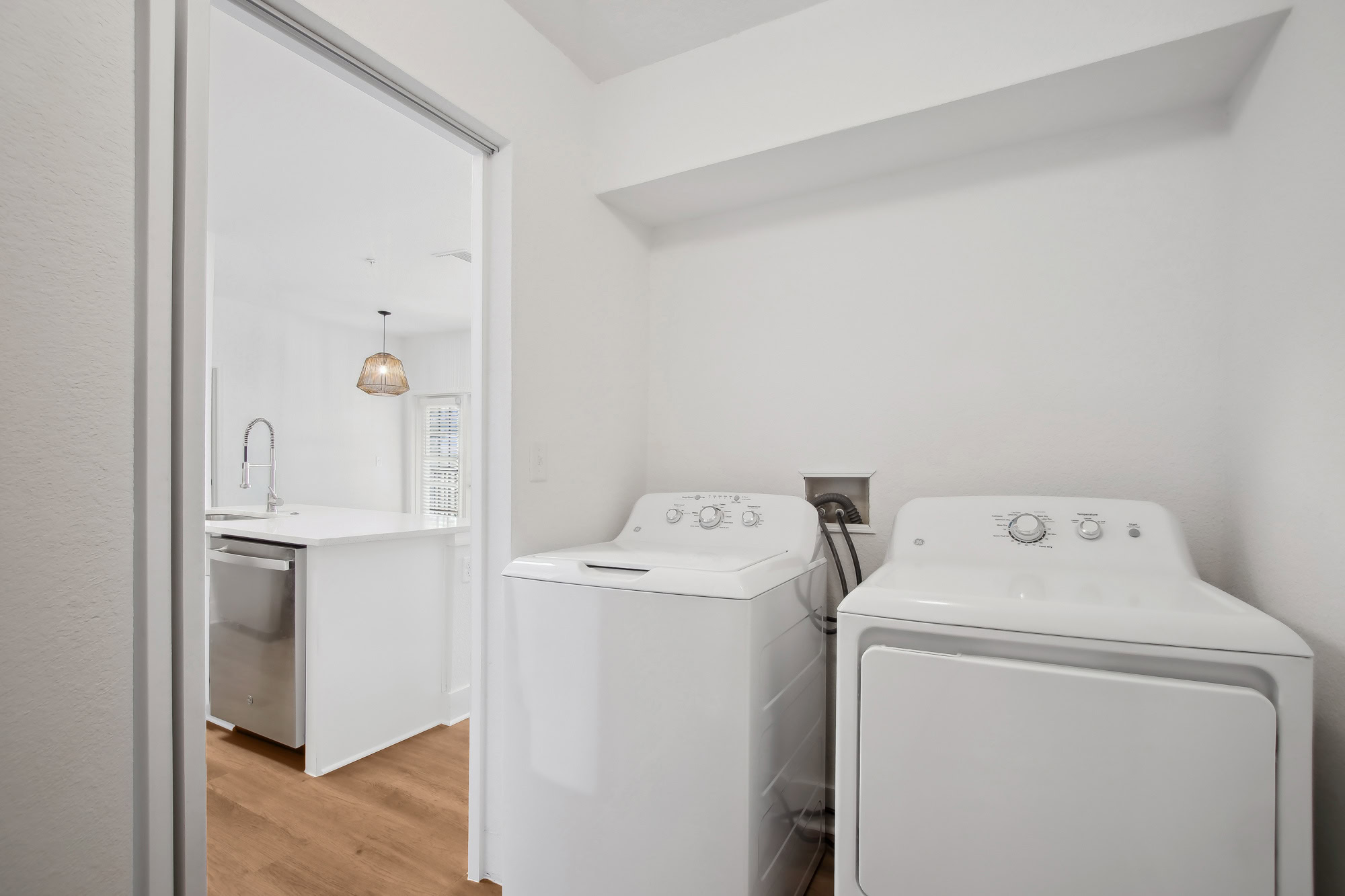 The washer and dryer in an apartment at Osprey Links at Hunter's Creek apartments in Orlando, Florida.