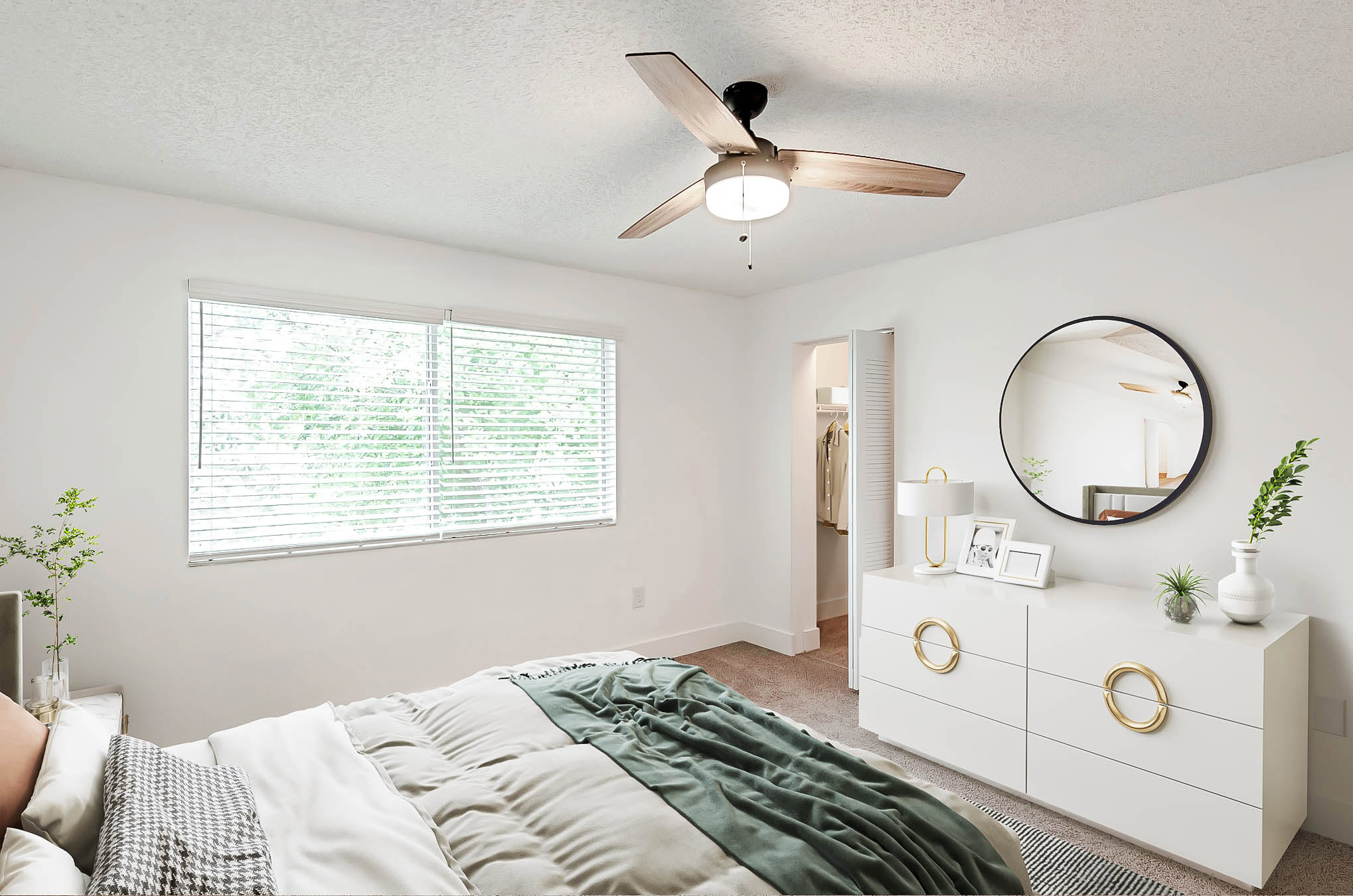 A bedroom at Sabal Pointe apartments in South Florida