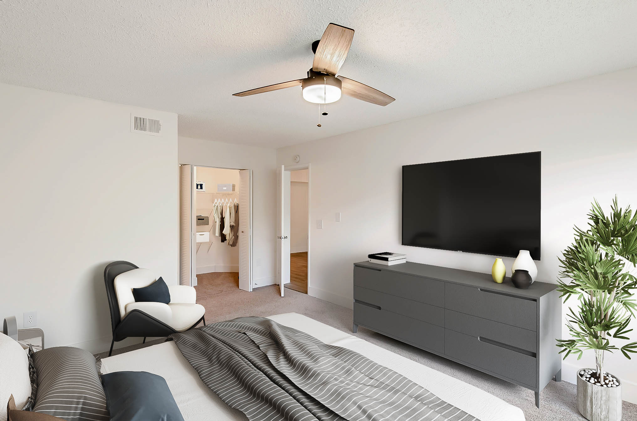 A bedroom at Sabal Pointe apartments in South Florida
