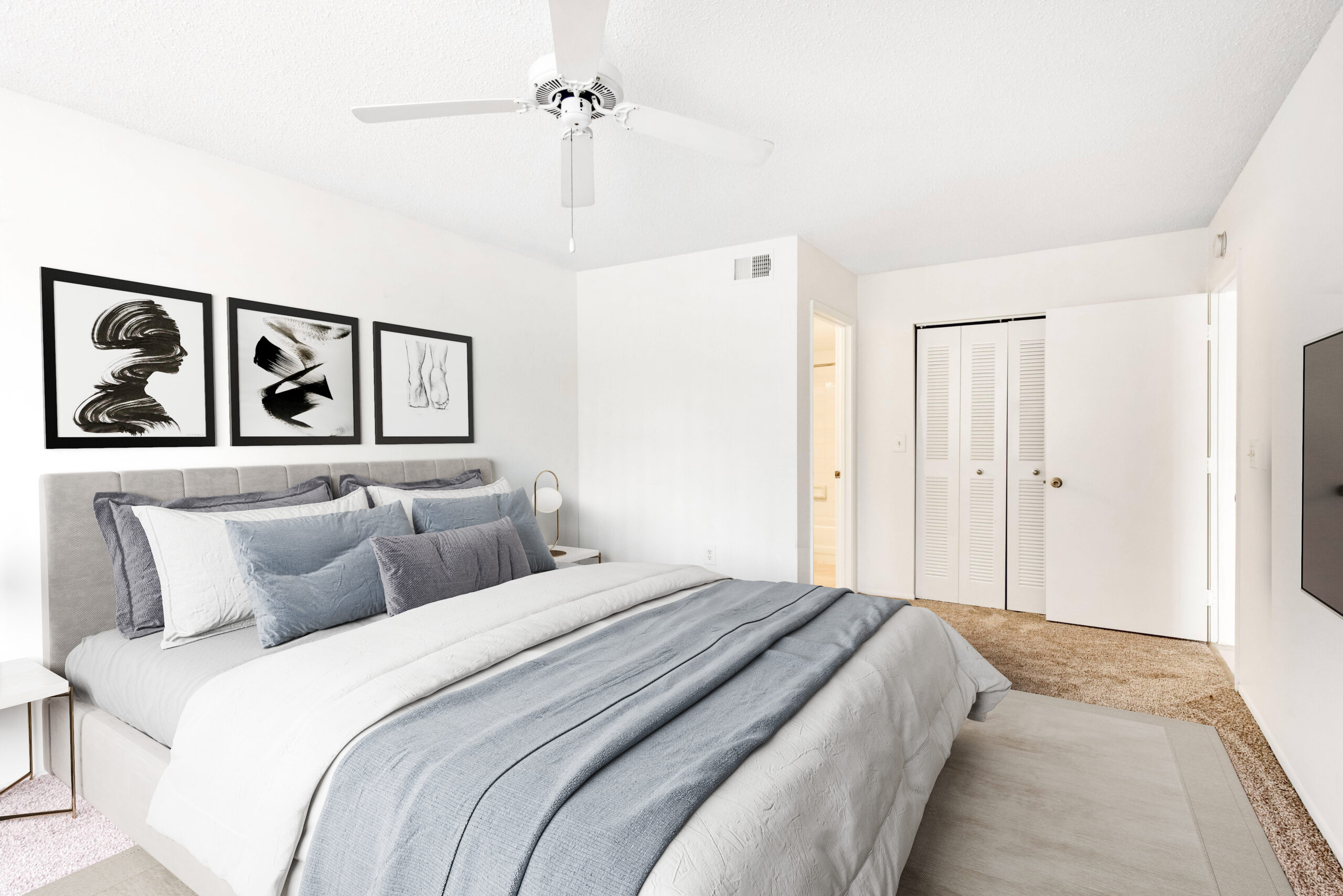 A bedroom at Sabal Pointe apartments in South Florida