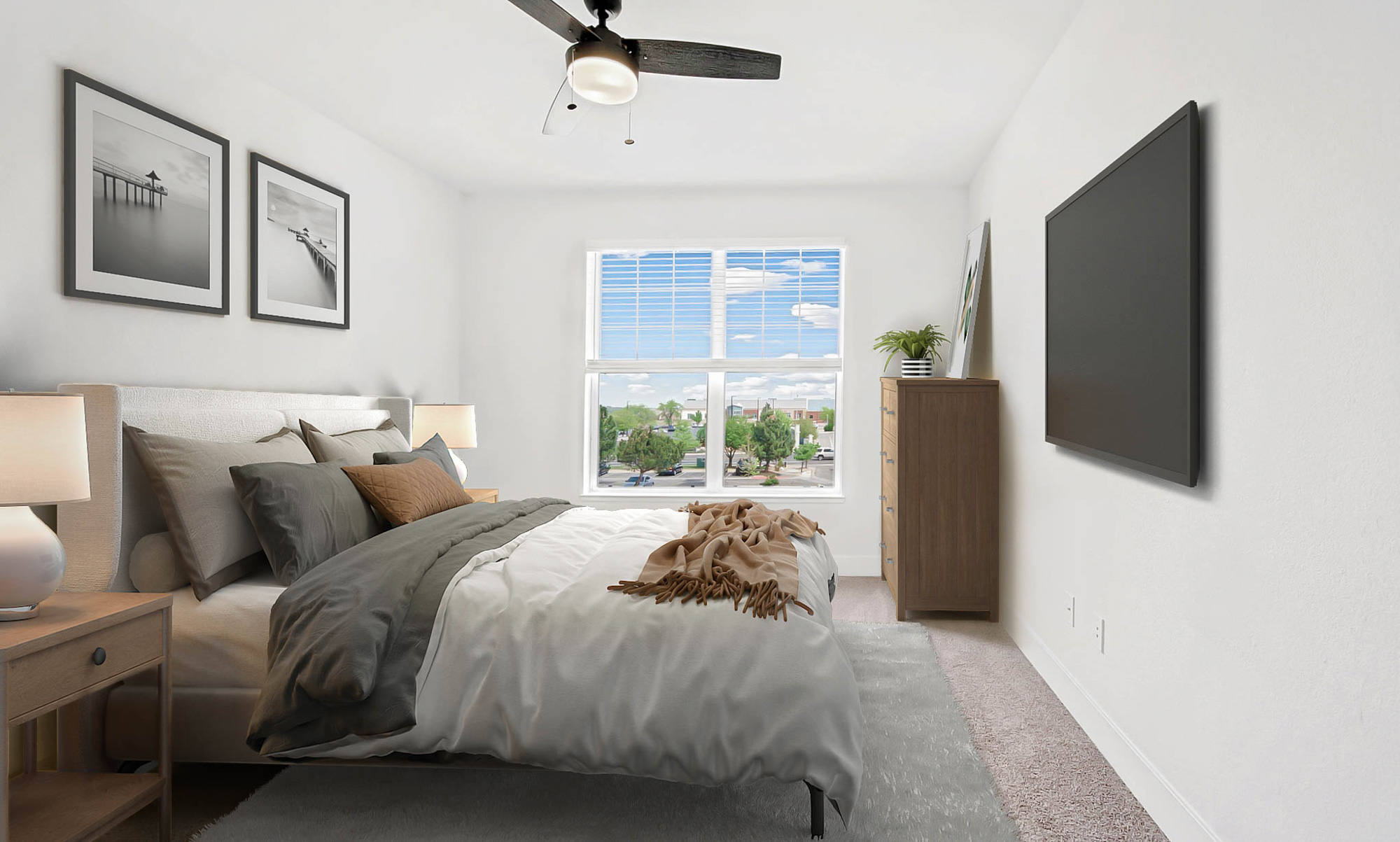 A bedroom in an apartment at The Village at Legacy Ridge near Denver, Colorado.