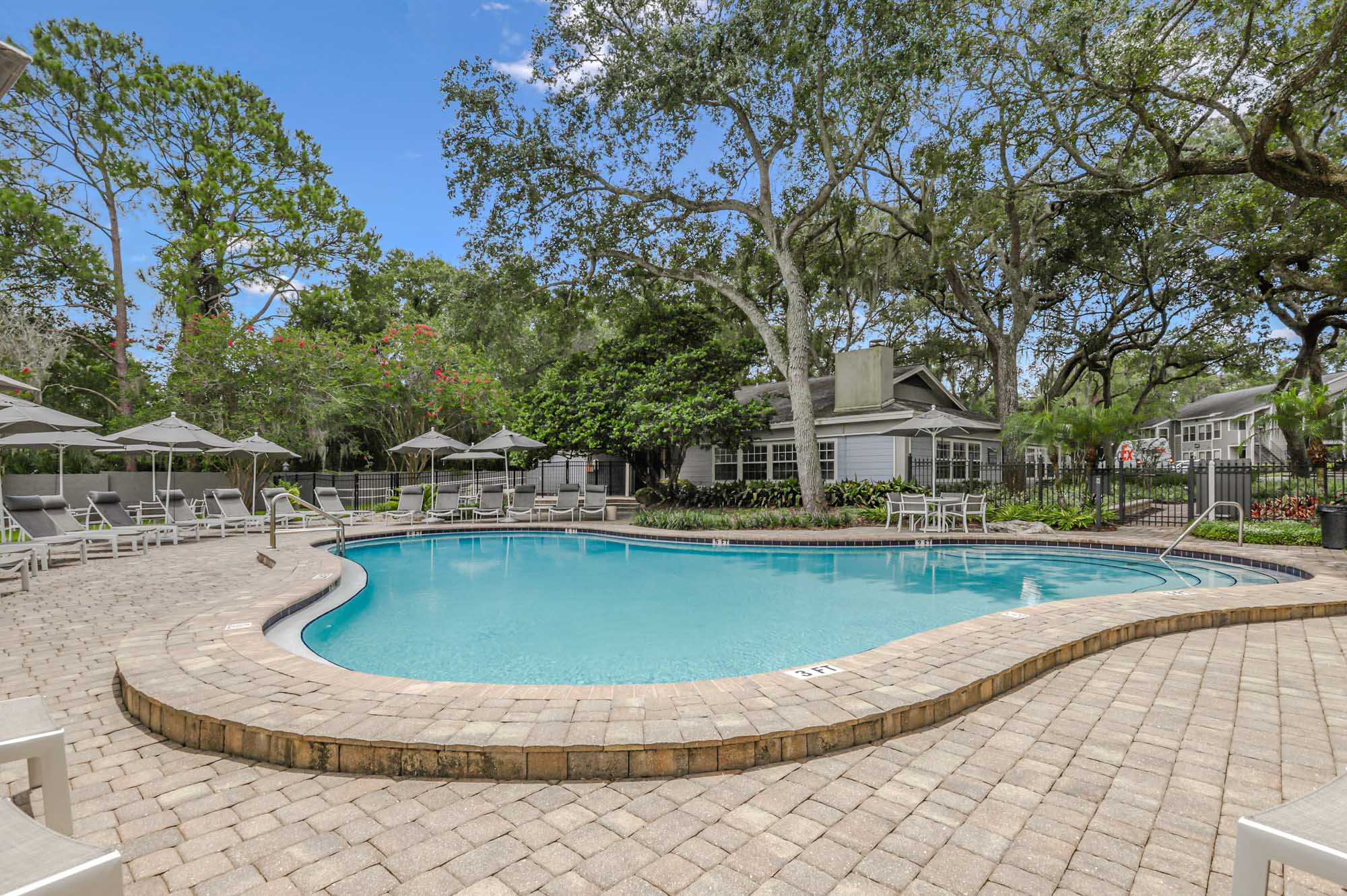 The pool at Oak Ramble apartments in Tampa, FL.