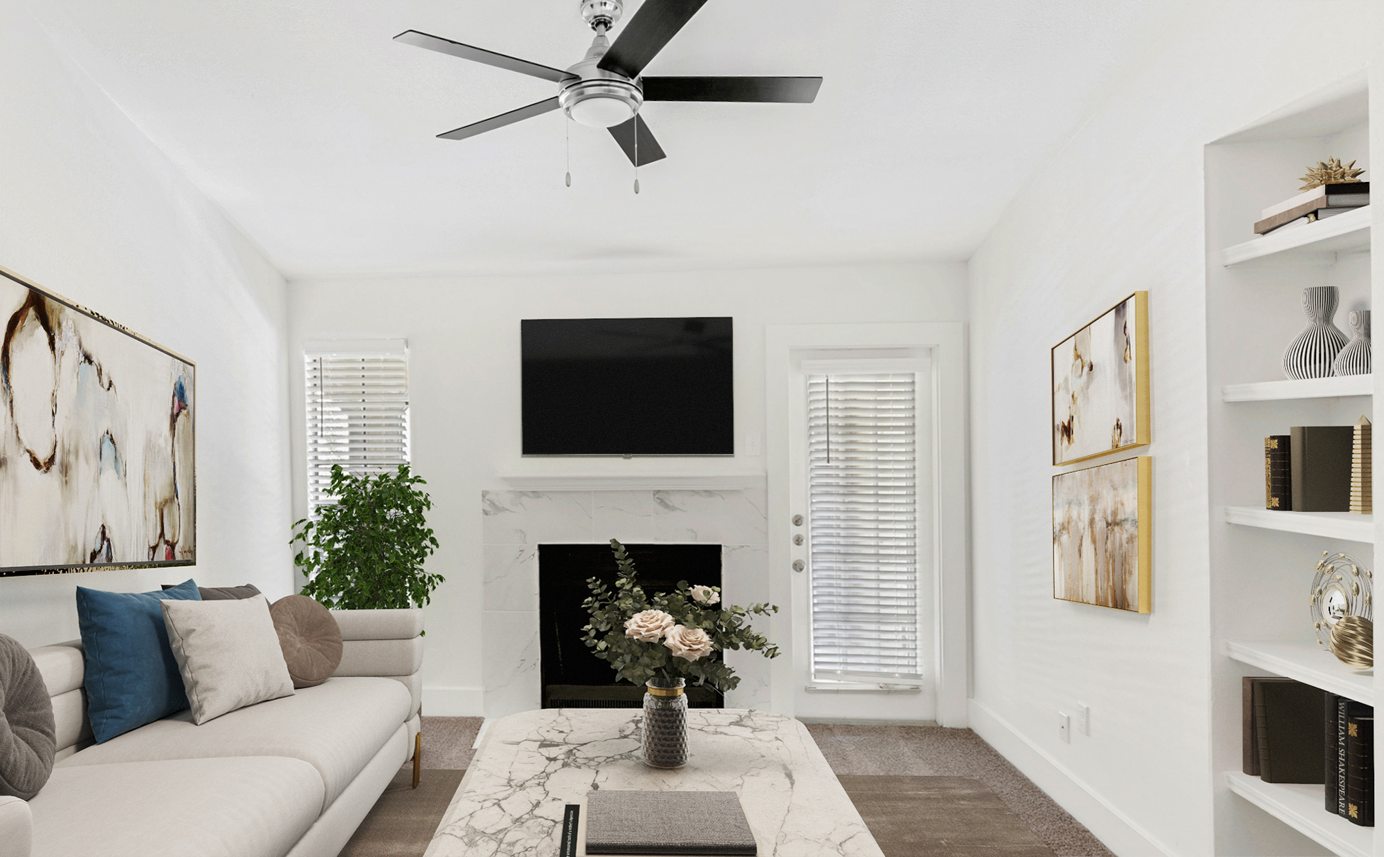 The living area of an apartment at The Arbors of Wells Branch in Austin, TX.