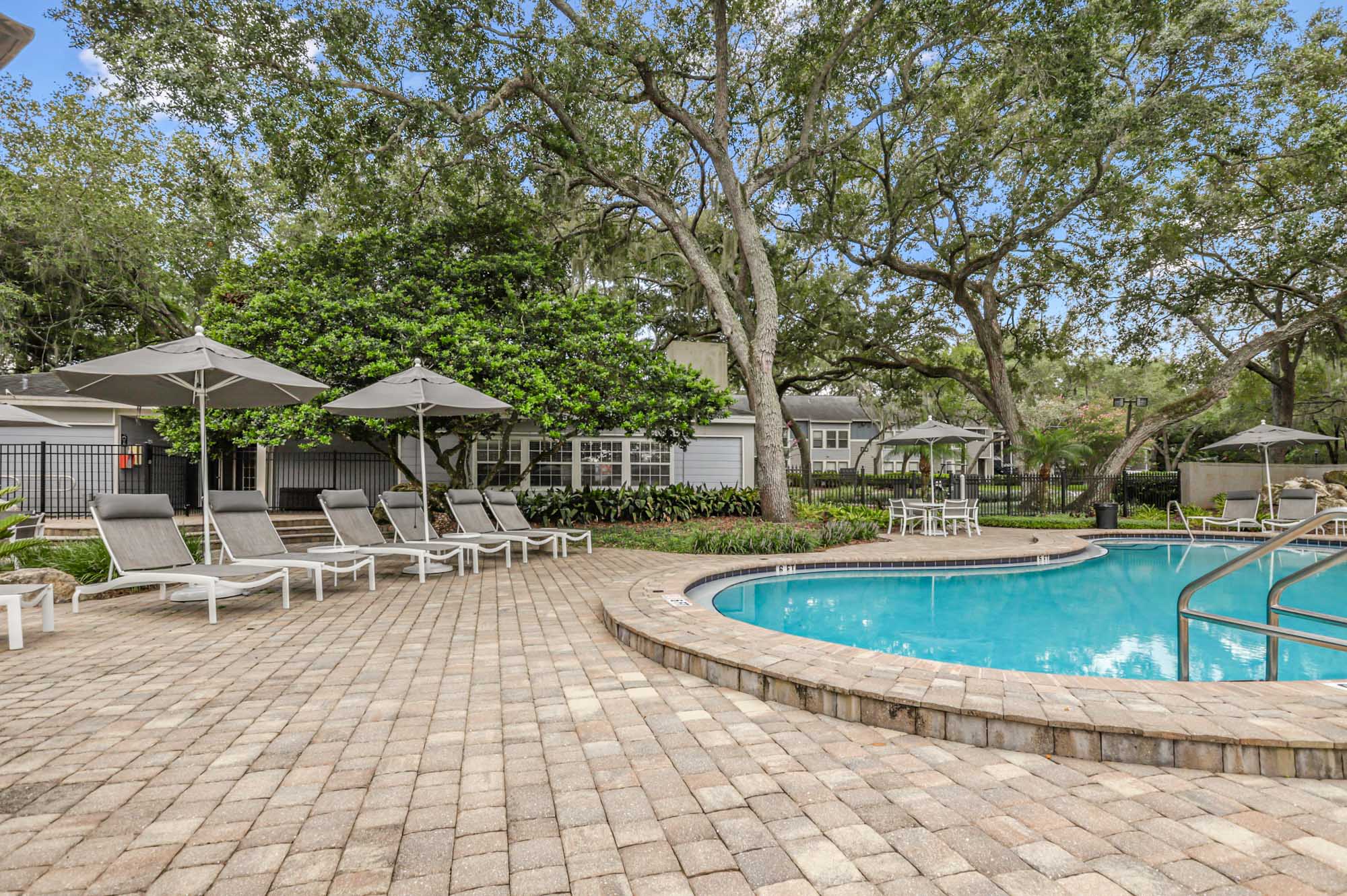 The pool at Oak Ramble apartments in Tampa, FL.