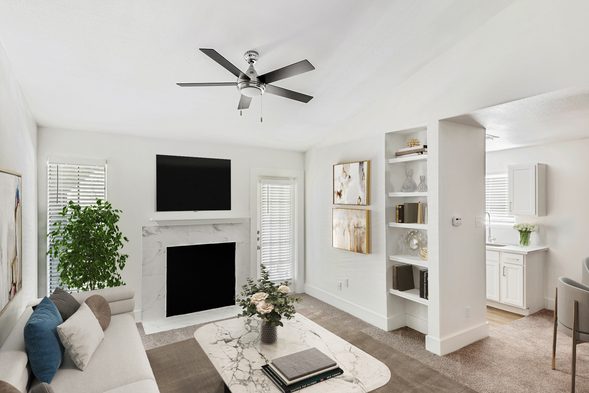 The living area of an apartment at The Arbors of Wells Branch in Austin, TX.